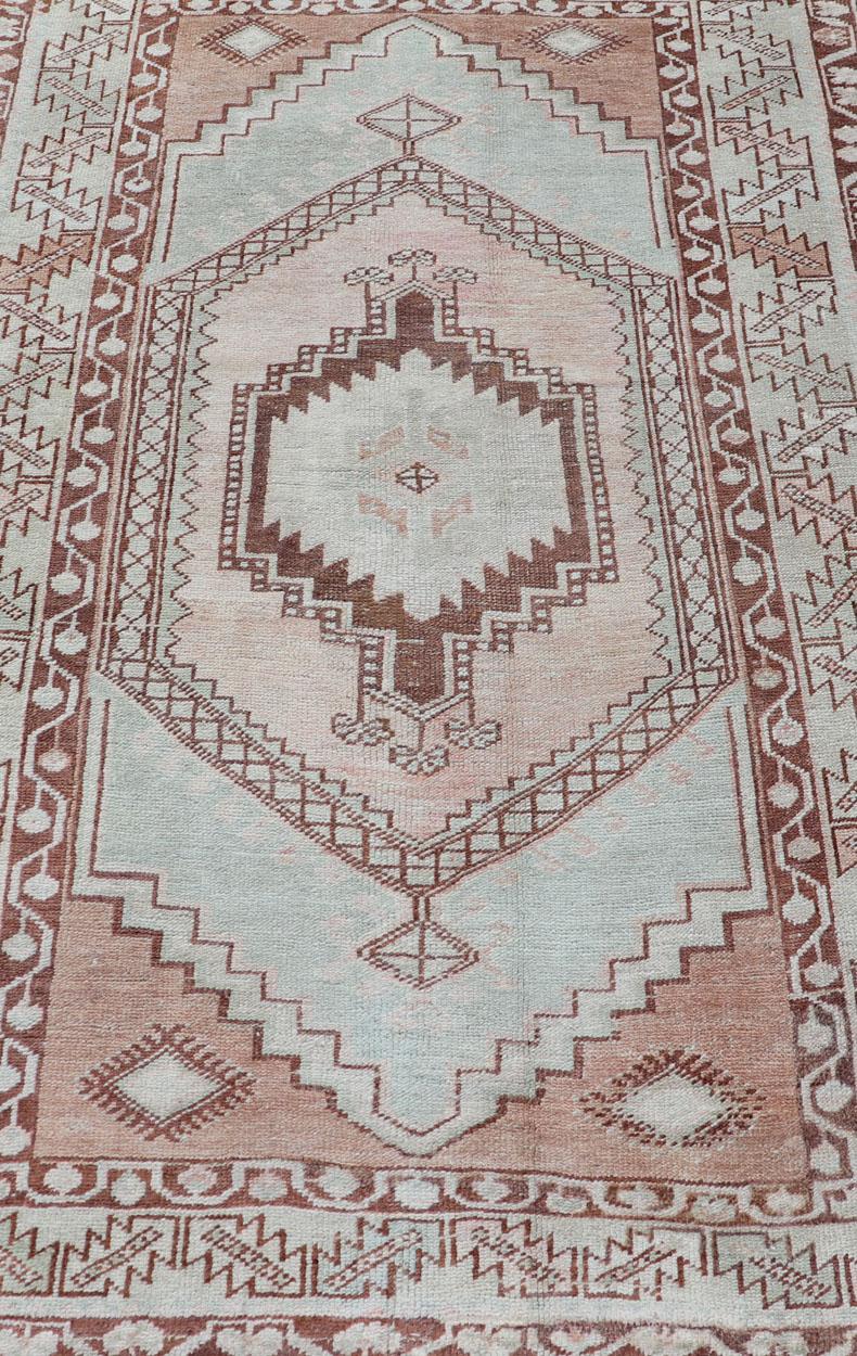 Wool Vintage Turkish Oushak Rug with Traditional Design in Muted Blue, Brown, Salmon For Sale