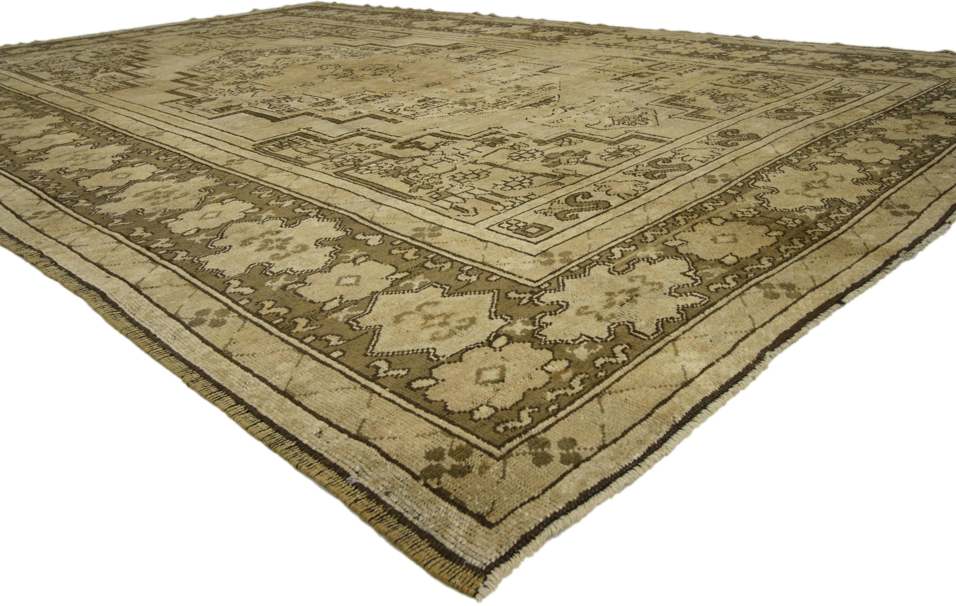 Hand-Knotted Vintage Turkish Oushak Rug with Traditional Style and Warm Earth-Tones For Sale