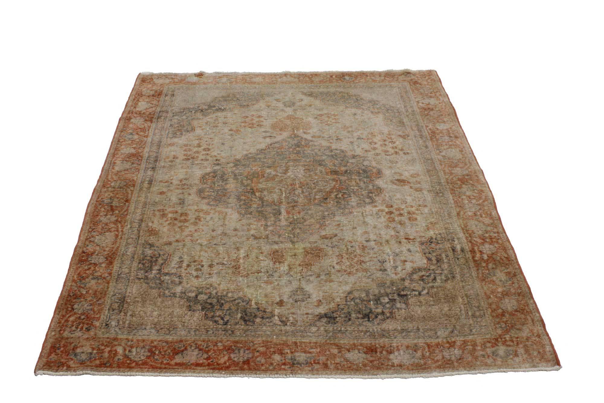 51700 distressed vintage Oushak rug with medallion and corner motif. This vintage Turkish rug features an intricate floral medallion resting on a large lozenge that coordinates with the spandrels. The Oushak accent rug is bordered in a band of wine