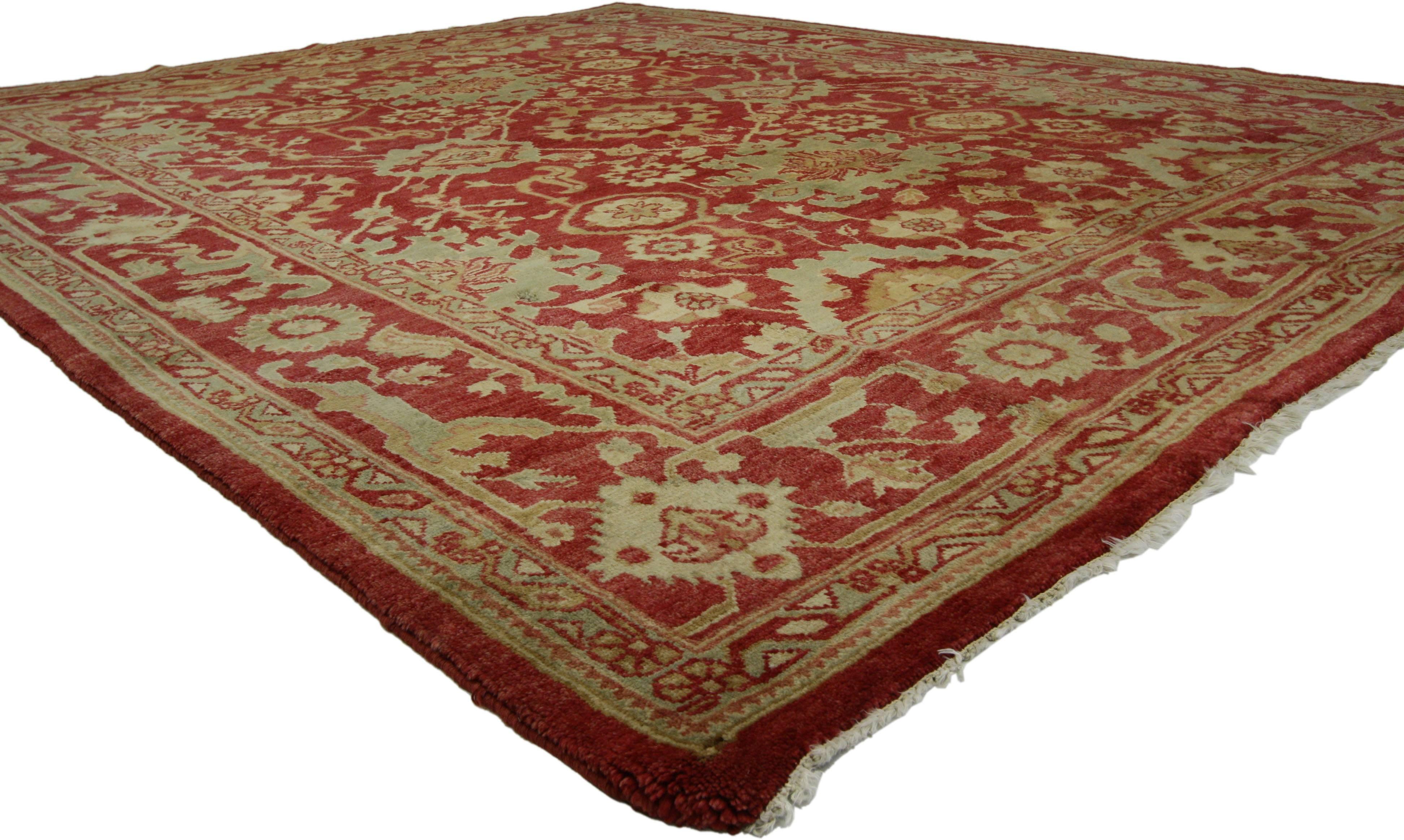 74643, vintage Turkish Oushak rug with traditional style. This hand-knotted wool vintage Turkish Oushak rug features an all-over geometric pattern composed of large scale palmette motifs connected with meandering angular vines. It is enclosed by a