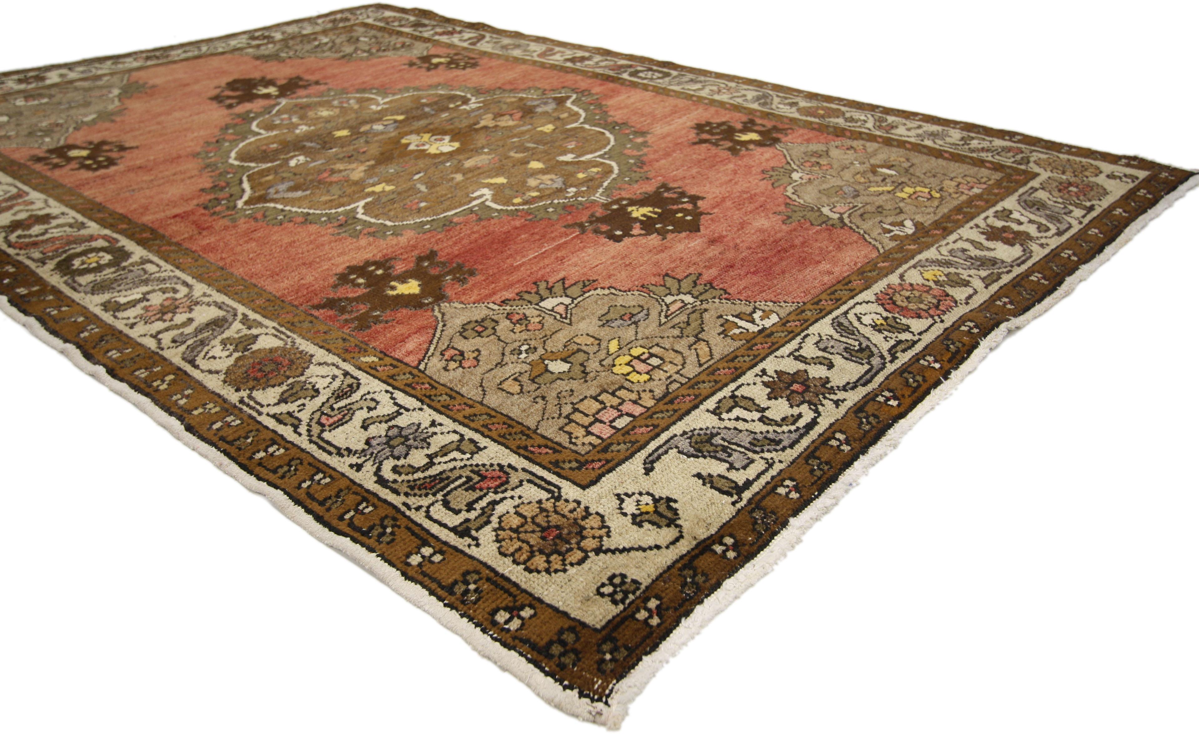50303 Vintage Turkish Oushak Rug with Traditional Style. Warm and inviting, this hand-knotted wool vintage Turkish Oushak rug features a brown centre medallion in an open abrashed rustic red field and ivory border with color tone variations.