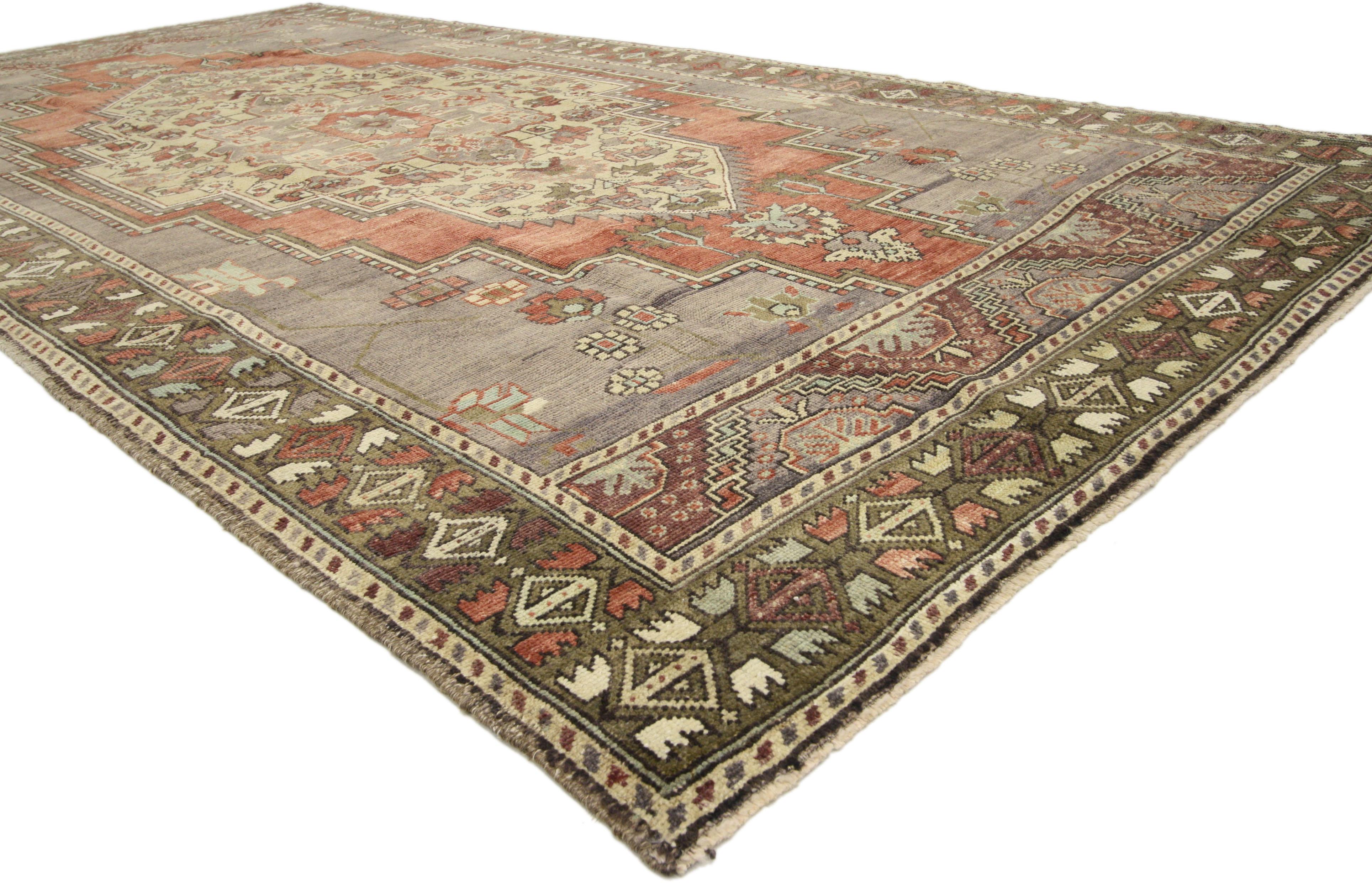 51359, vintage Turkish Oushak rug with Traditional style, Wide Hallway runner. Hand knotted wool Turkish Oushak area rug features a center medallion surrounded by geometric motifs in an open red and gray stepped cut-out field with rich waves of