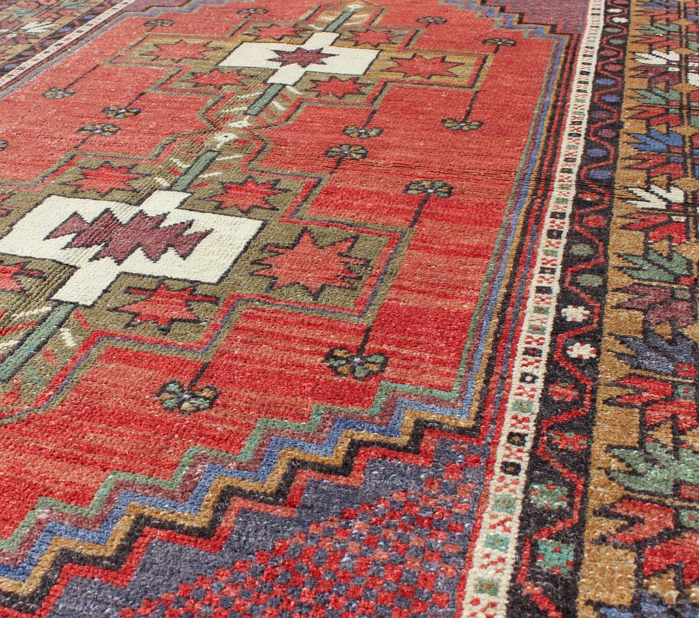 20th Century Vintage Turkish Oushak Rug with Tribal Medallion in Red, Green, Yellow & Purple For Sale