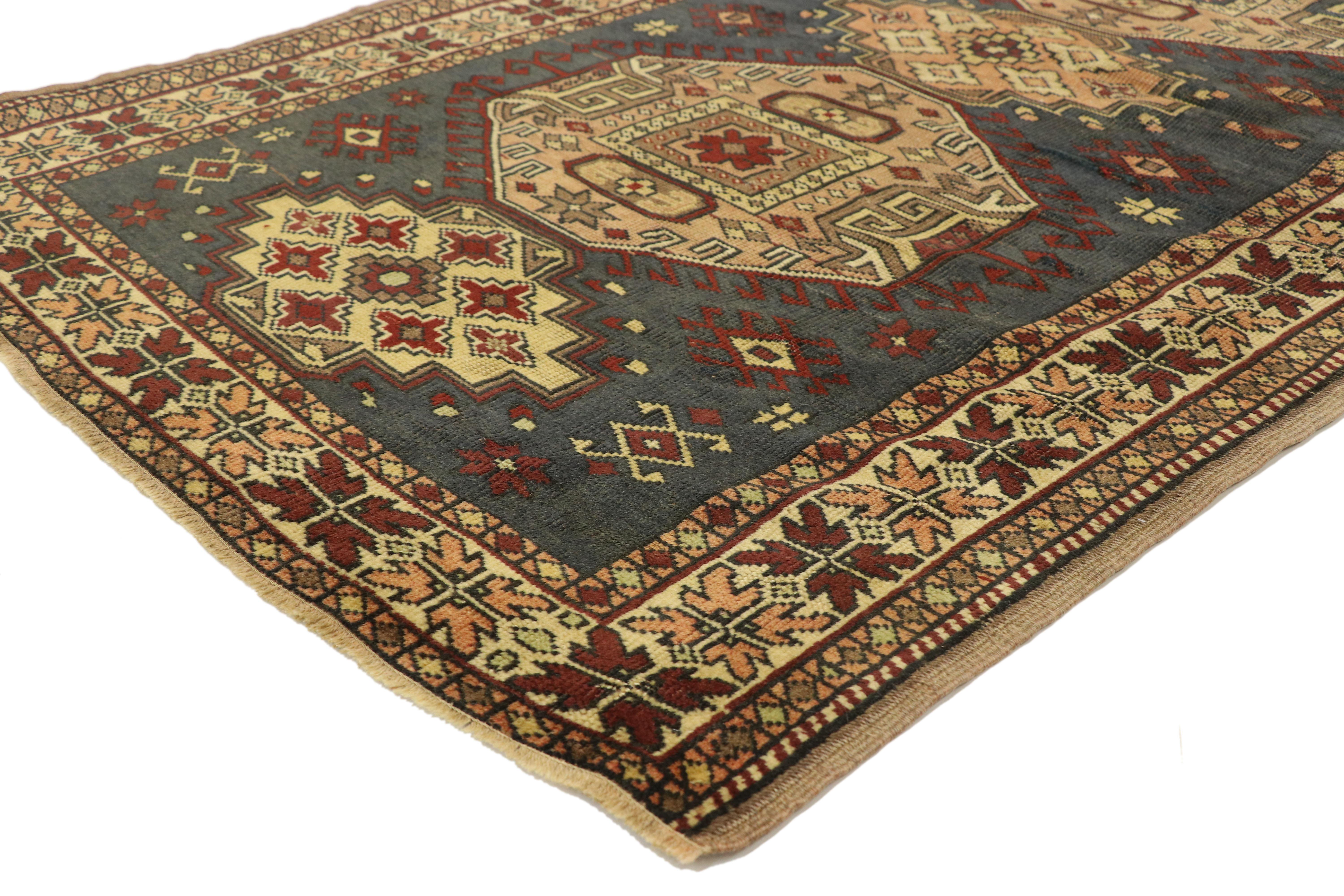 51406 vintage Turkish Oushak rug with Tribal style 03'07 x 06'05. Full of tiny details and a bold expressive design and tribal style, this hand-knotted wool vintage Turkish Oushak rug is a captivating vision of woven beauty. The abrashed field
