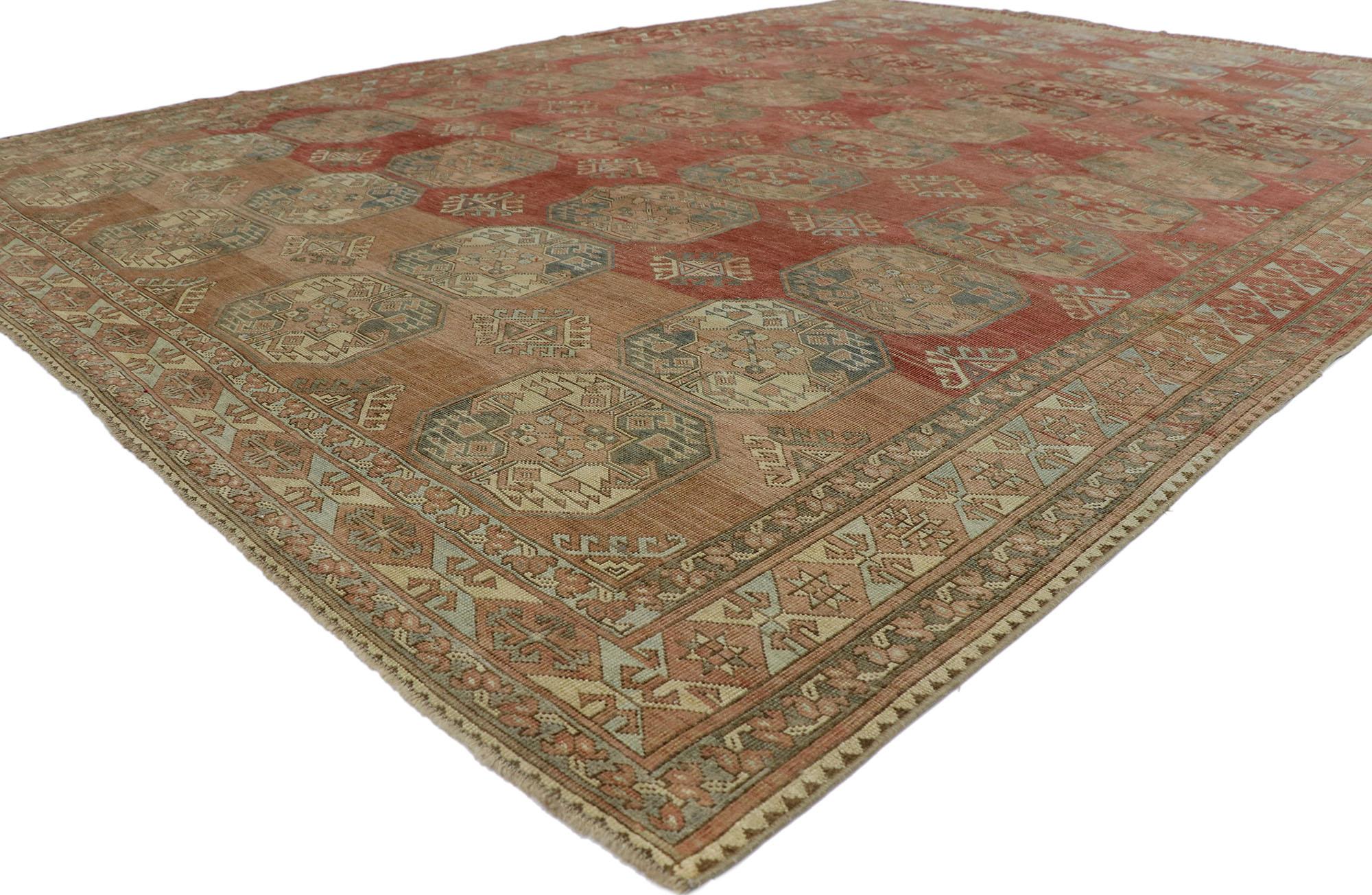 53658 Vintage Turkish Oushak Rug with Turkoman Design 08'06 x 11'07.
Abrash. Hand-knotted wool. Made in Turkey.