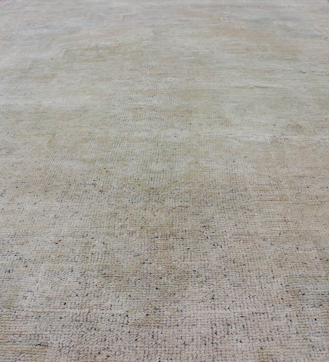 Vintage Turkish Oushak Rug with Understated Design and Muted Tones For Sale 5