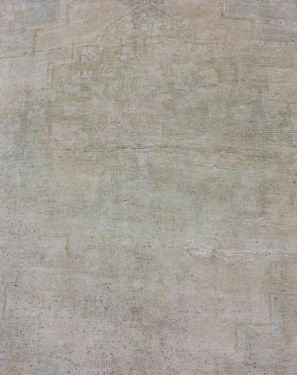 Vintage Turkish Oushak Rug with Understated Design and Muted Tones For Sale 1