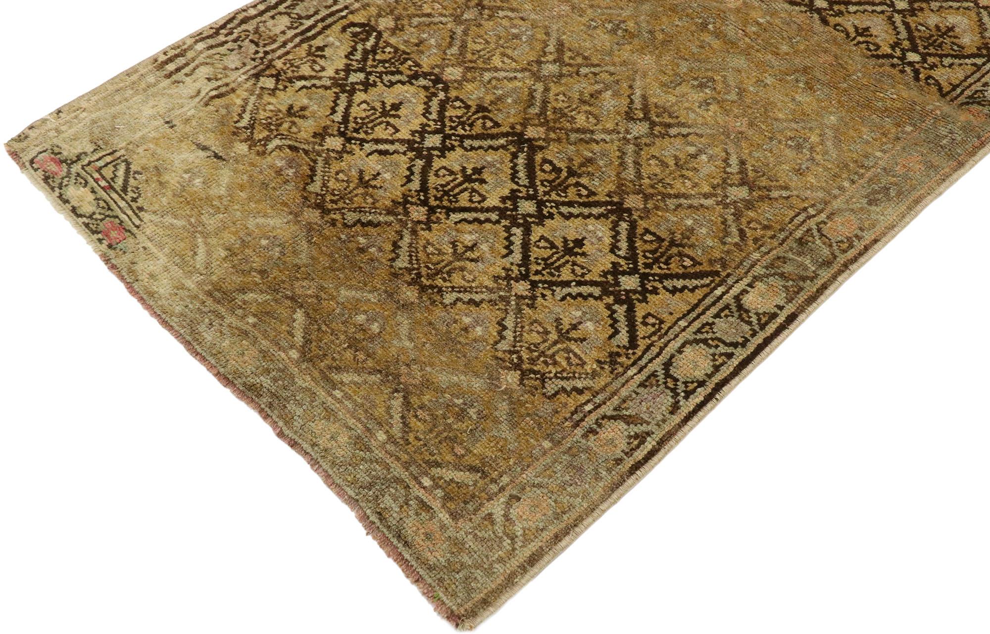 53097, vintage Turkish Oushak rug with Warm Shaker style. Warm and inviting, this hand knotted wool vintage Turkish Oushak rug charms with ease. The abrashed brown field features an all-over diamond botanical trellis design with stylized florals.