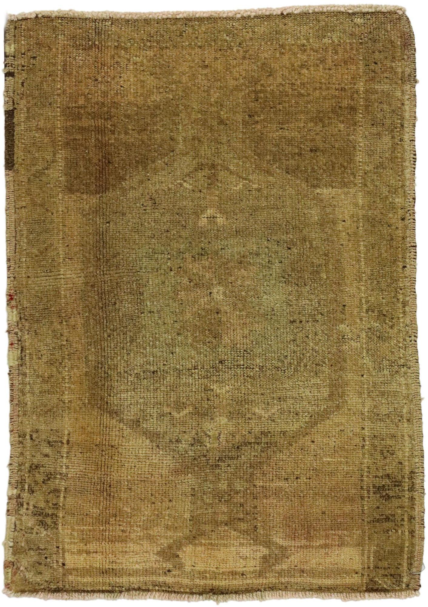 51421 Vintage Turkish Oushak Yastik Scatter Rug, Small Accent Rug 02'01 x 03'00. This hand-knotted wool vintage Turkish Oushak yastik scatter rug features an inconspicuous hexagonal medallion floating in an abrashed field. It is enclosed with a