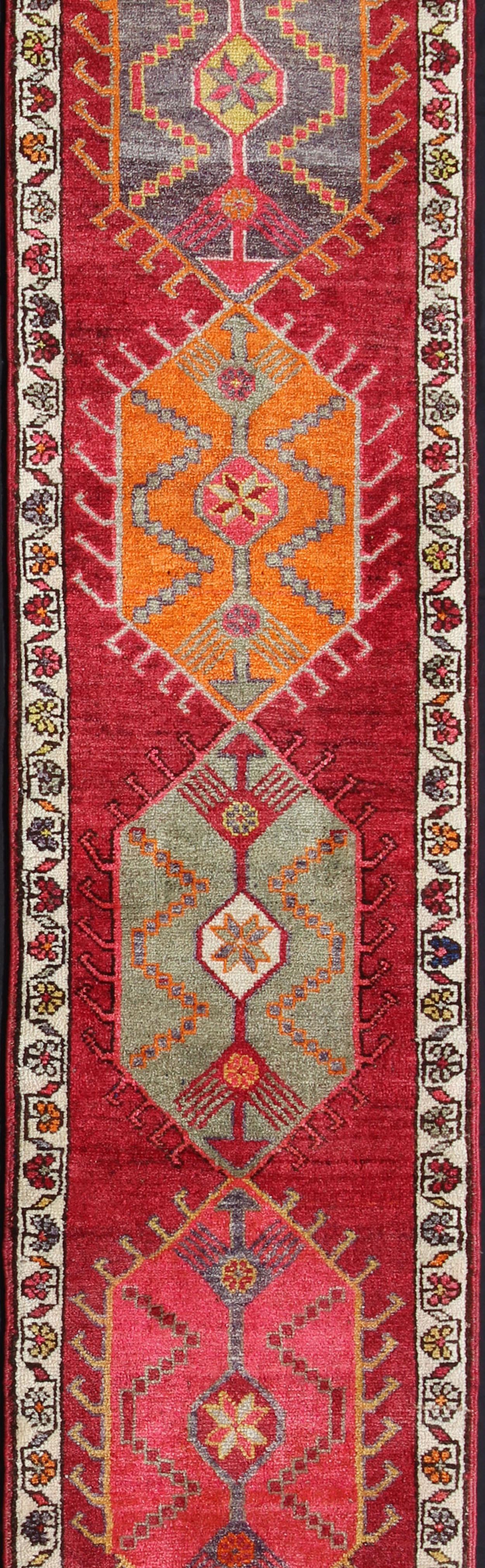 Hand-Knotted Vintage Turkish Oushak Runner with Bright and Colorful Medallion Design For Sale