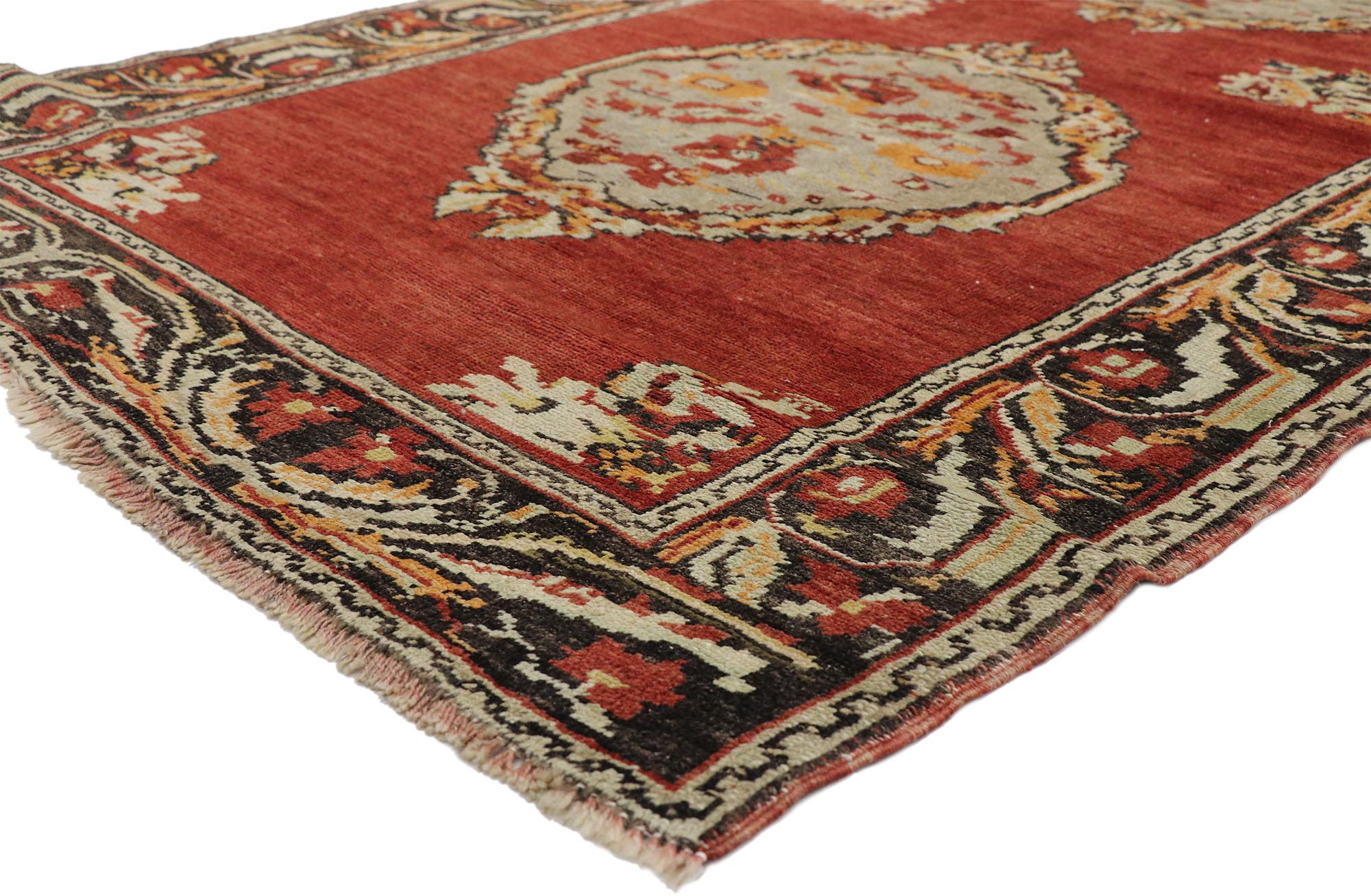 52128 Vintage Turkish Oushak Hallway Runner with Neoclassical Art Nouveau Style. This hand knotted wool vintage Turkish Oushak runner features three round medallions with abstract floral motifs across an abrashed red field. Bouquets are spread