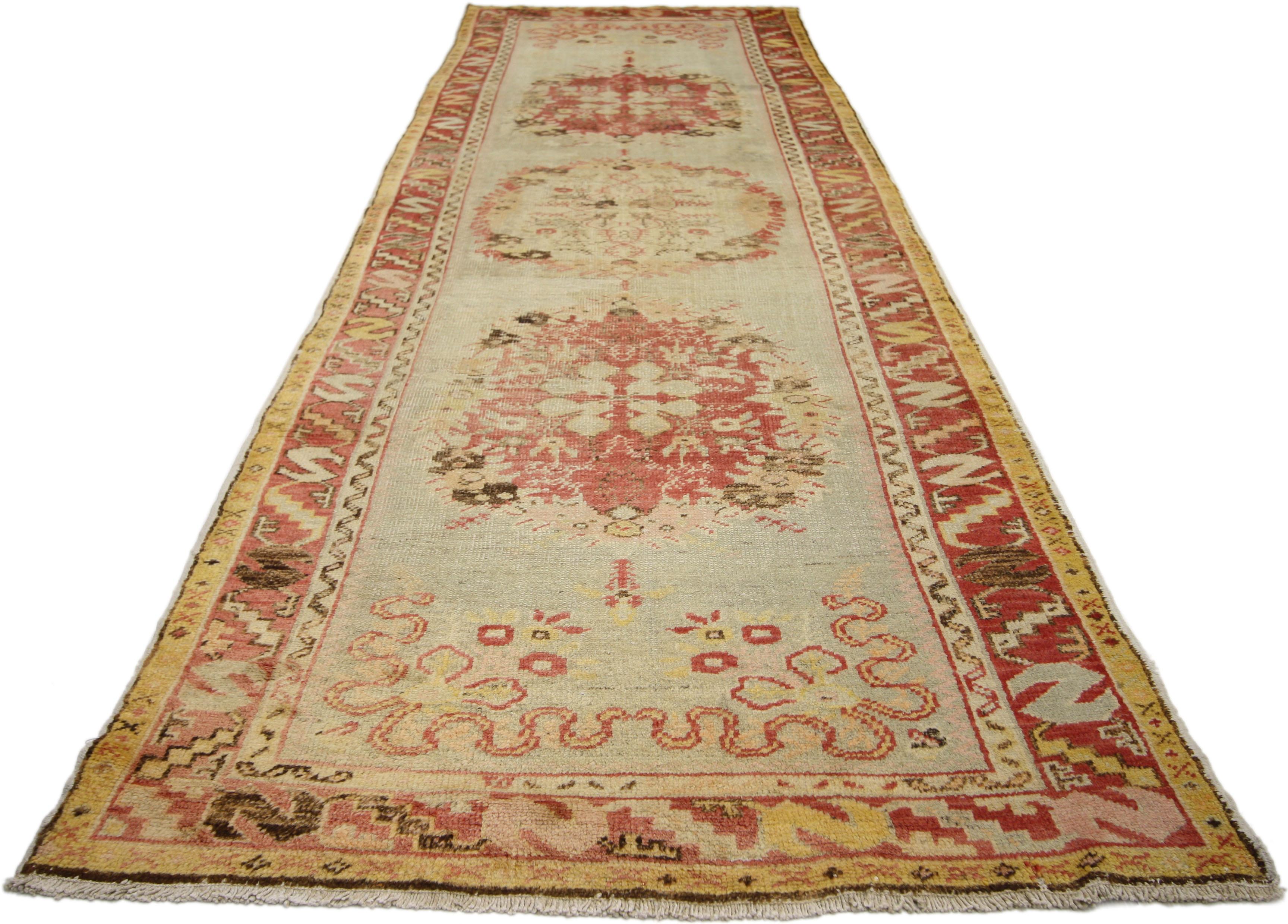 Distressed Vintage Turkish Oushak Runner with Romantic French Country Style In Distressed Condition For Sale In Dallas, TX