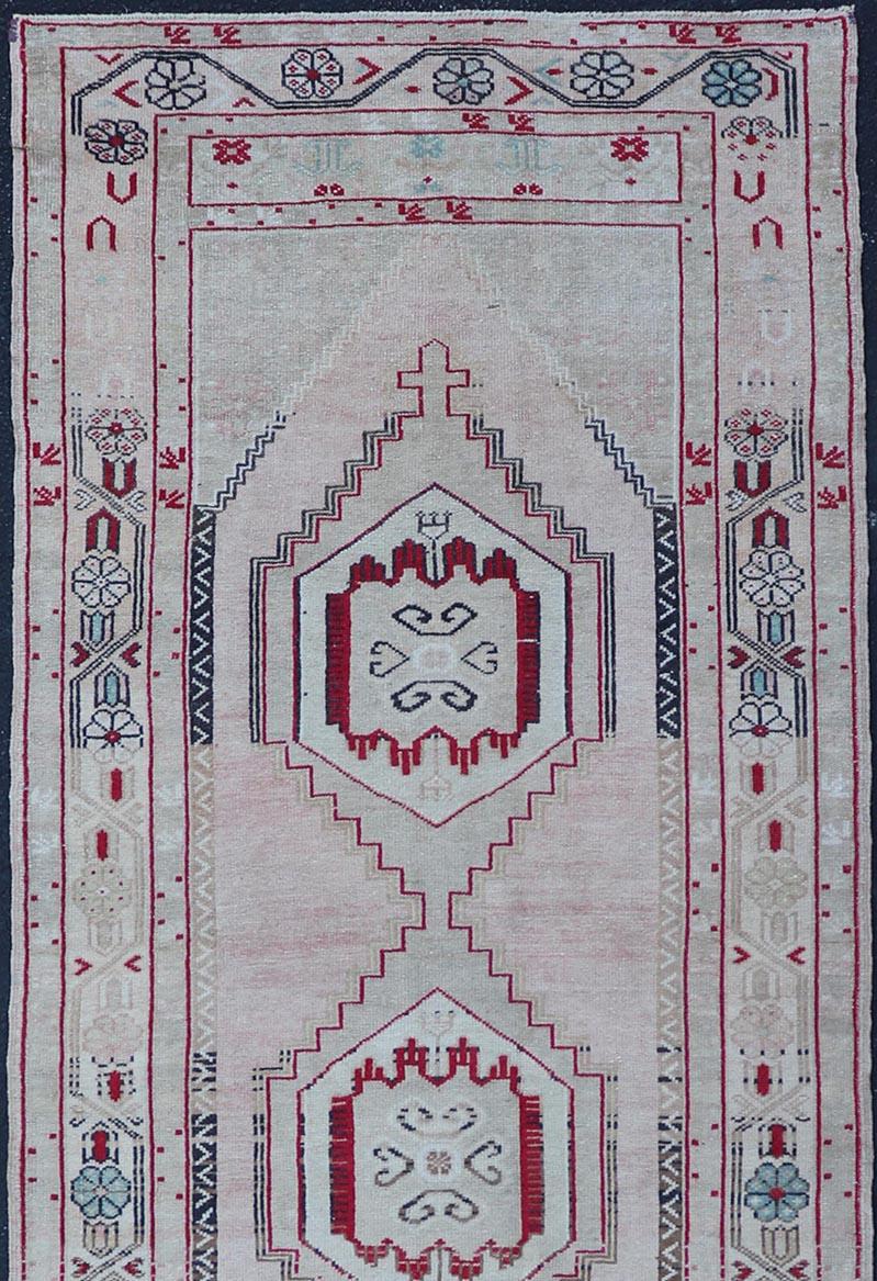 Hand-Knotted Vintage Turkish Oushak Runner in Cream, Dark Blue, Pink and Red For Sale