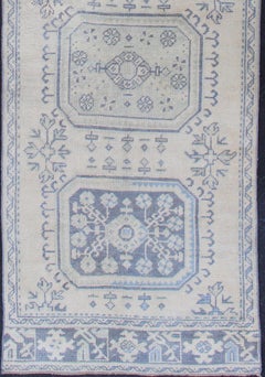 Vintage Turkish Oushak Runner in Faded Blue in Neutral Background