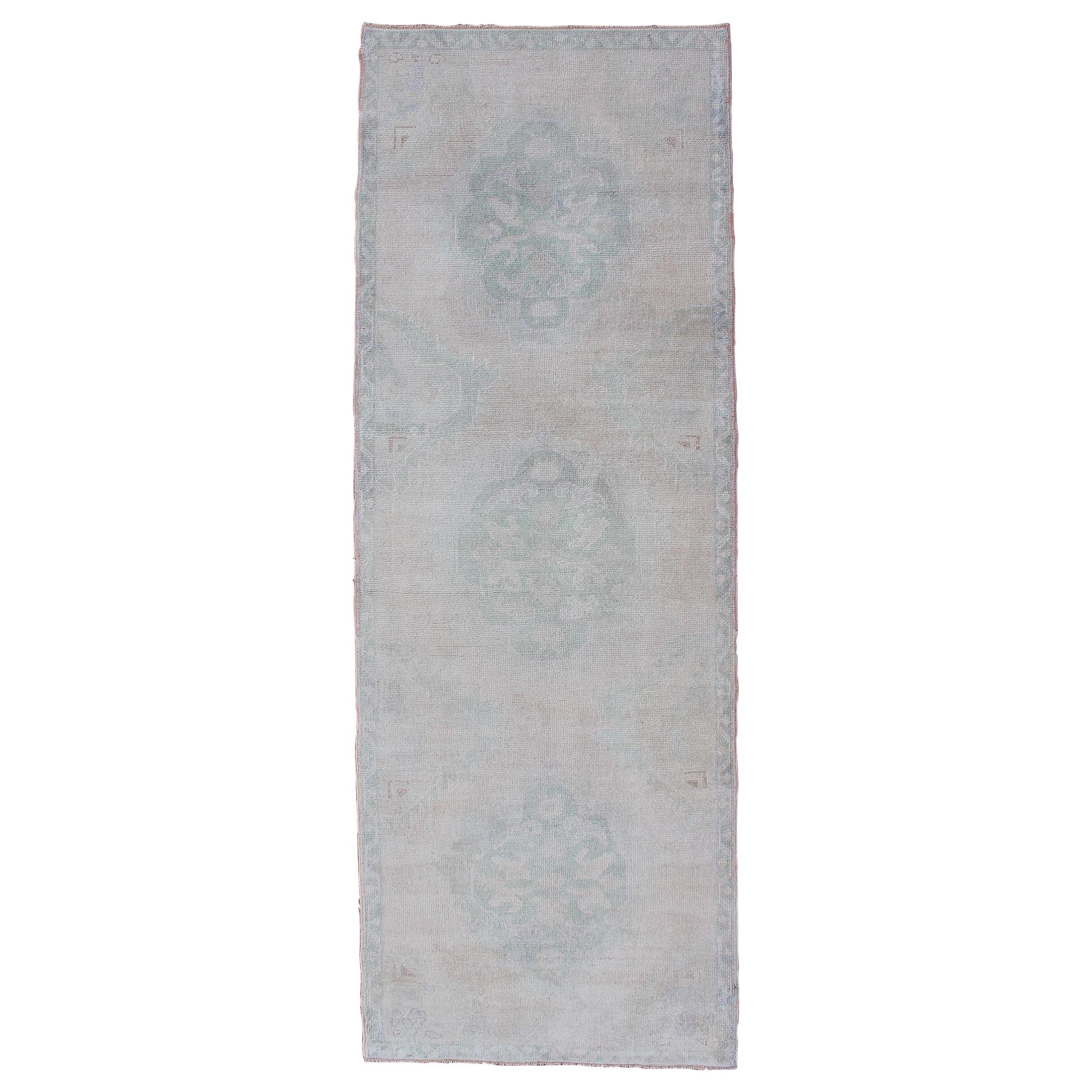 Vintage Turkish Oushak Runner in Faded Green and Blue in Neutral Background