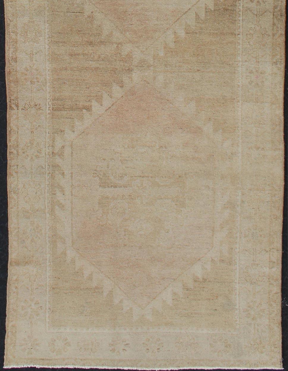 Hand-Knotted Vintage Turkish Oushak Runner Neutral Colors with Tribal Design in Earth Colors For Sale
