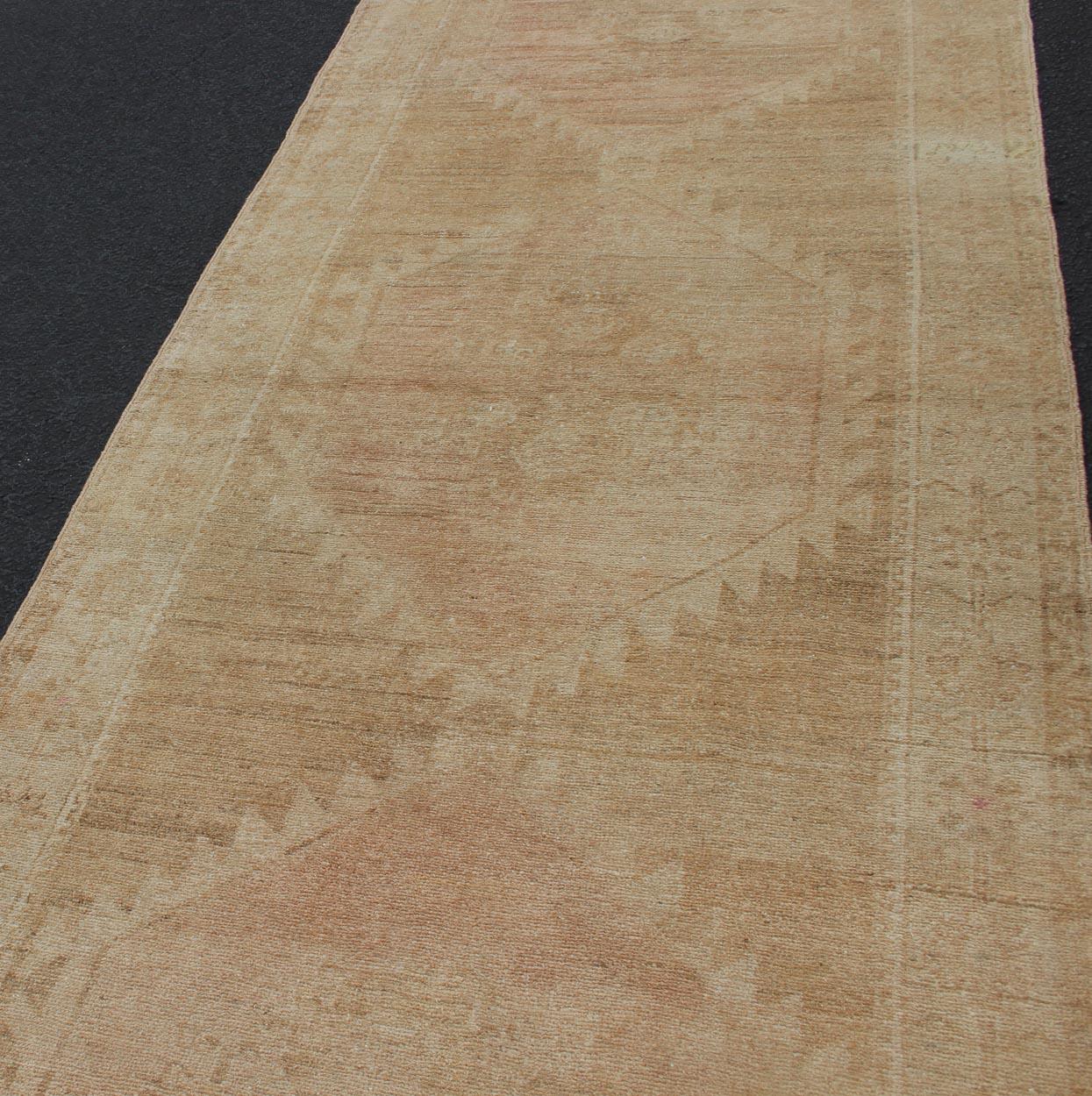 20th Century Vintage Turkish Oushak Runner Neutral Colors with Tribal Design in Earth Colors For Sale