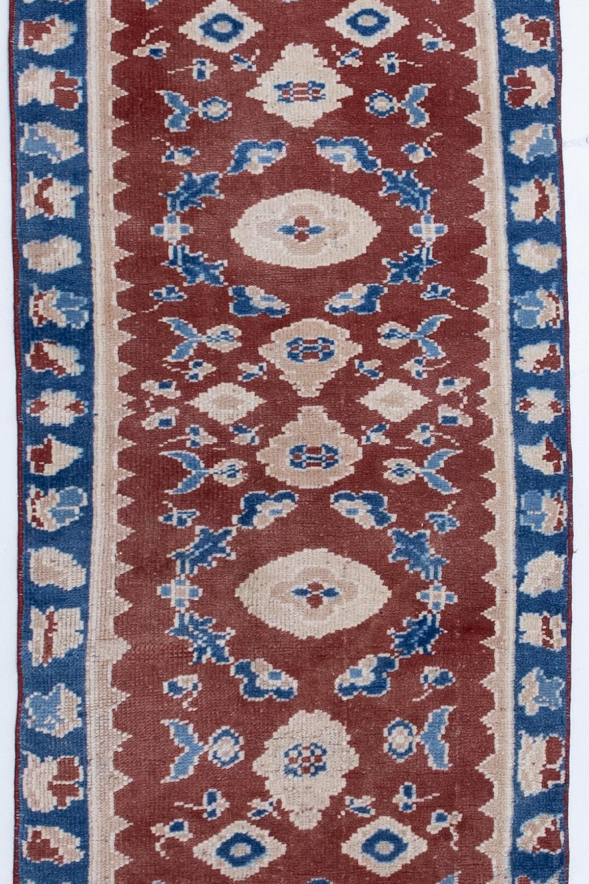 Age: Circa 1960

Colors: red, blue, ivory

Pile: medium

Wear Notes: 0

Material: wool

Vibrant and original colorway, this midcentury Turkish runner has a lovely red field and blue accents. Soft underfoot and safe for high traffic