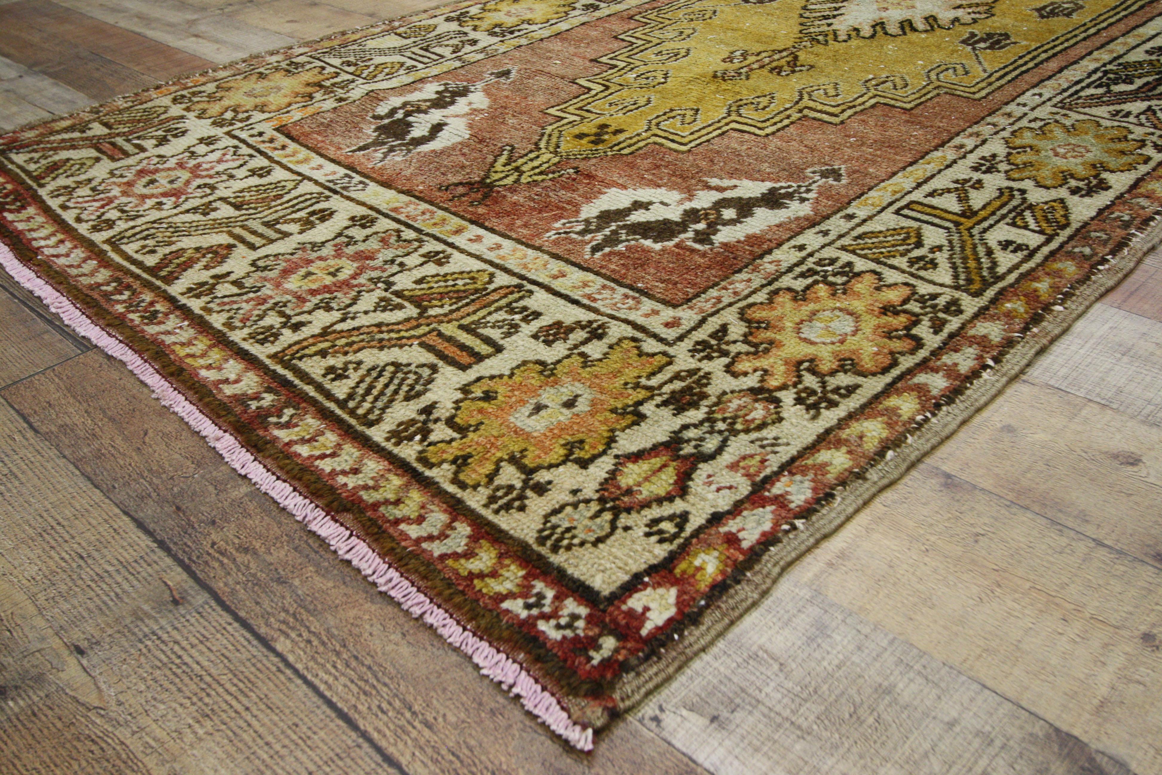 52411, vintage Turkish Oushak runner, tribal style hallway runner. This hand knotted wool vintage Turkish Oushak runner features two large stepped hexagonal medallions with anchor pendants spread across an abrashed field. Each medallion contains