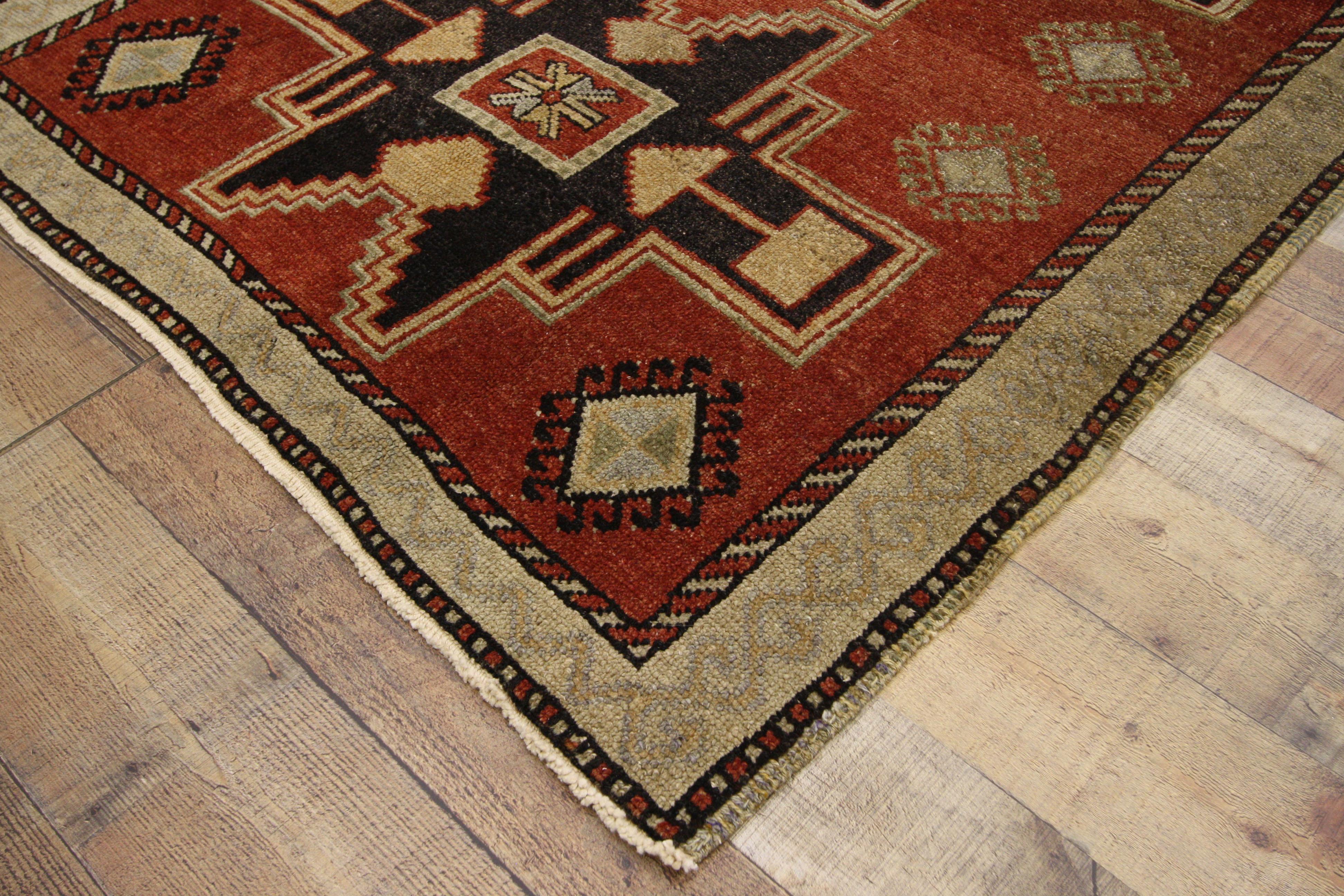 52389 Vintage Turkish Oushak Runner, Tribal Style Hallway Runner 03’10 x 11’01. This hand-knotted wool vintage Turkish Oushak runner features five angular geometric medallions, variations of the Lesghi star motif symbolizing happiness. Hook-edged