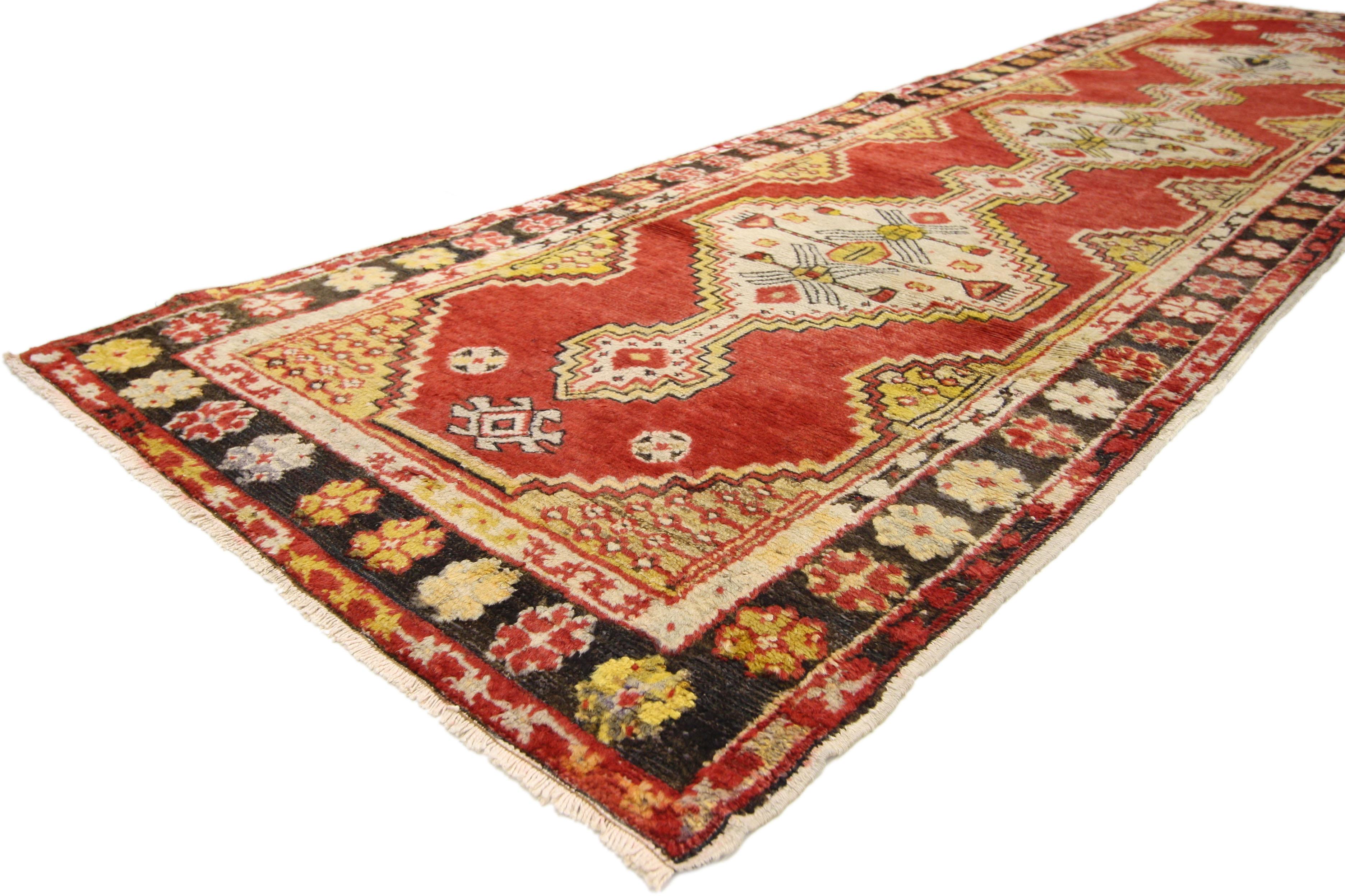 50727 vintage Turkish Oushak runner with Arts & Crafts style, Hallway runner. This hand knotted wool vintage Turkish Oushak runner features stepped hexagonal pole medallions with anchor pendants spread across an abrashed vermilion field. The