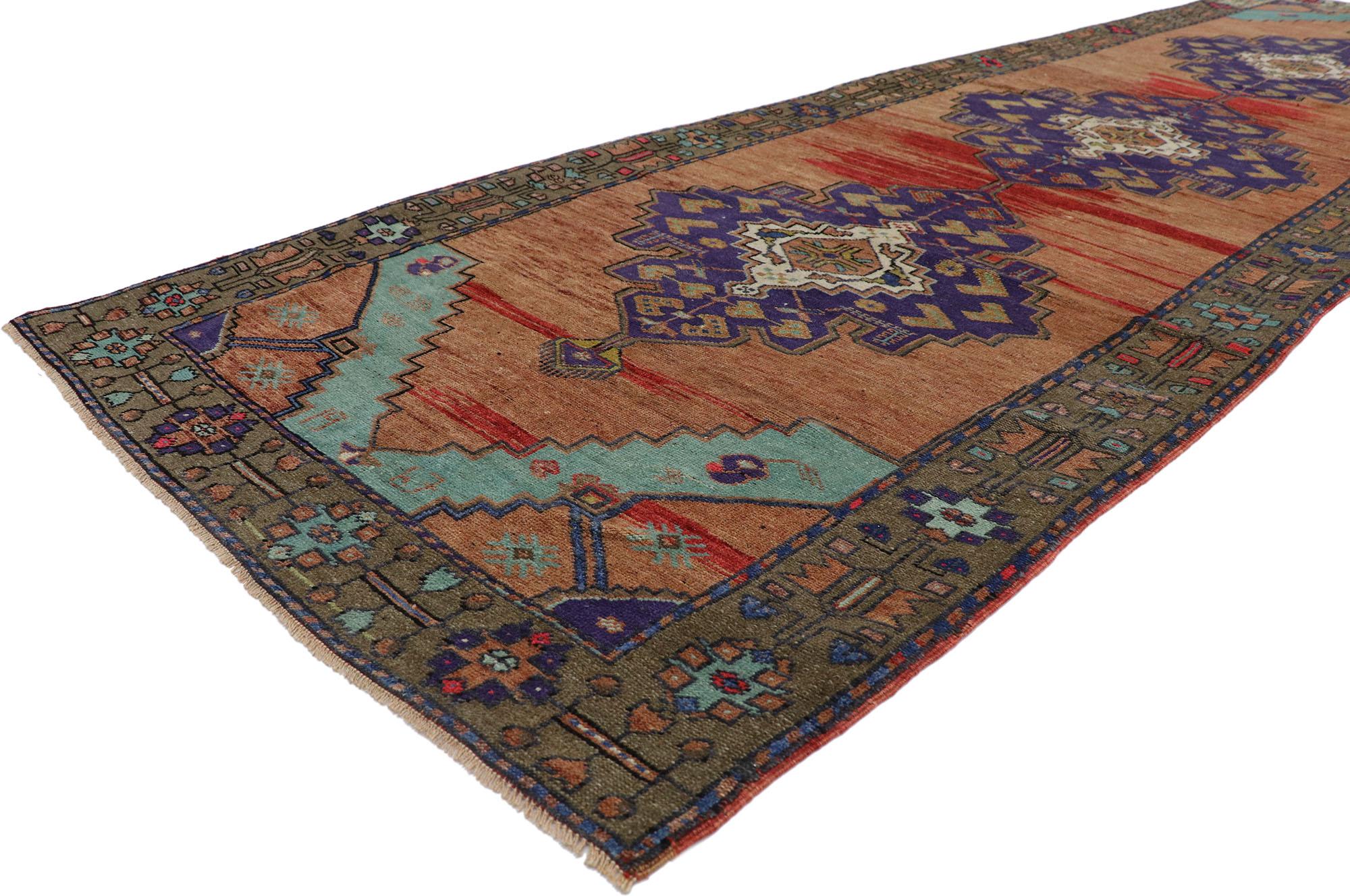 53616 vintage Turkish Oushak Runner 03'06 x 12'00. Full of tiny details and a bold expressive design combined with vibrant colors and tribal style, this hand-knotted wool vintage Turkish Oushak hallway runner is a captivating vision of woven beauty.
