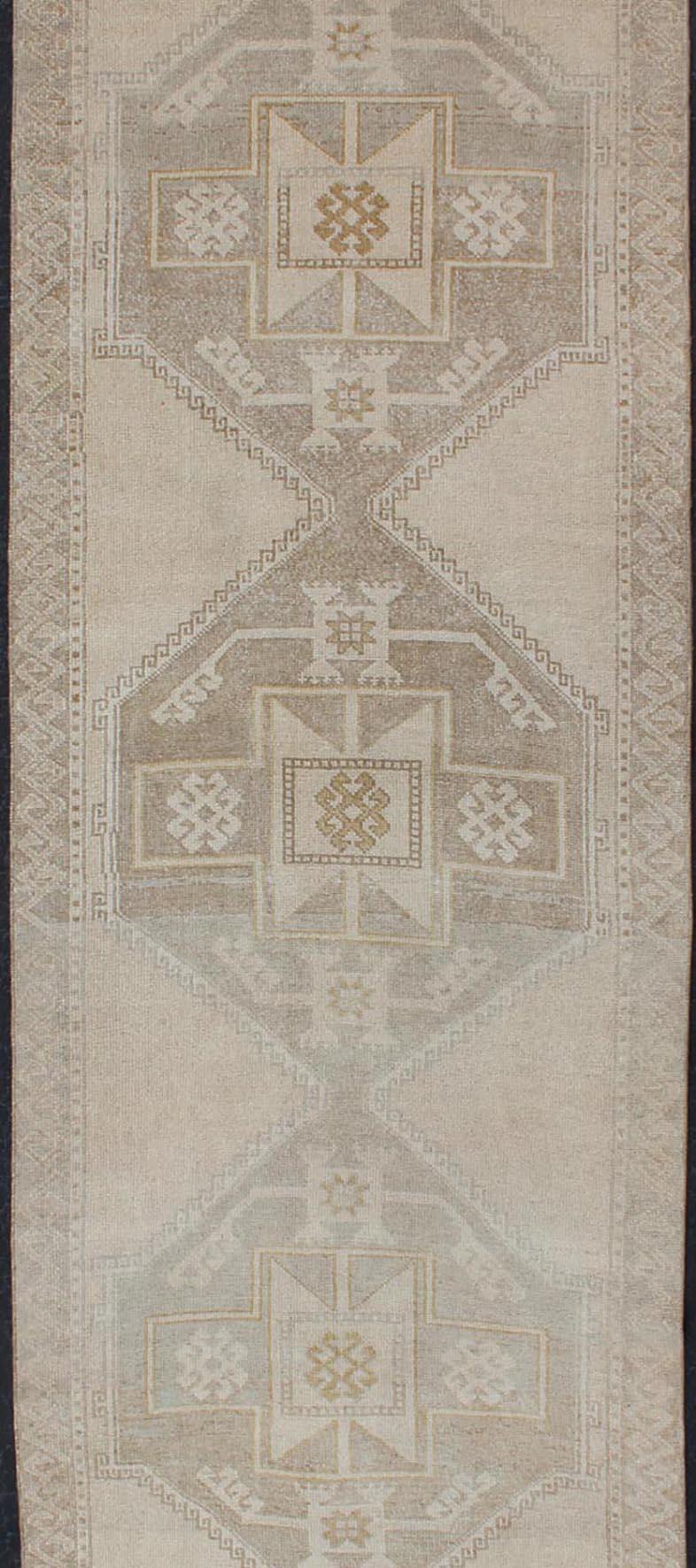 Vintage Turkish Oushak Runner with Etched Medallion Design in Soft Muted Tones In Good Condition For Sale In Atlanta, GA