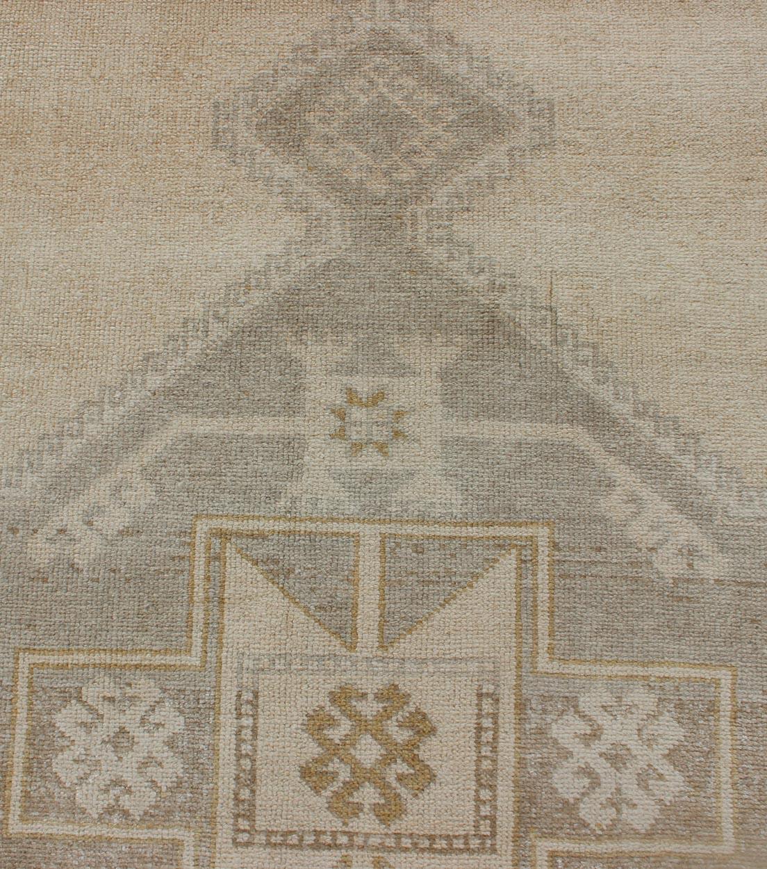 Vintage Turkish Oushak Runner with Etched Medallion Design in Soft Muted Tones For Sale 1