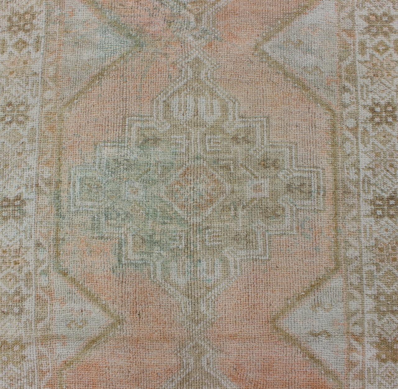 Wool Vintage Turkish Oushak Runner with Faded Coral, Green and Light Brown