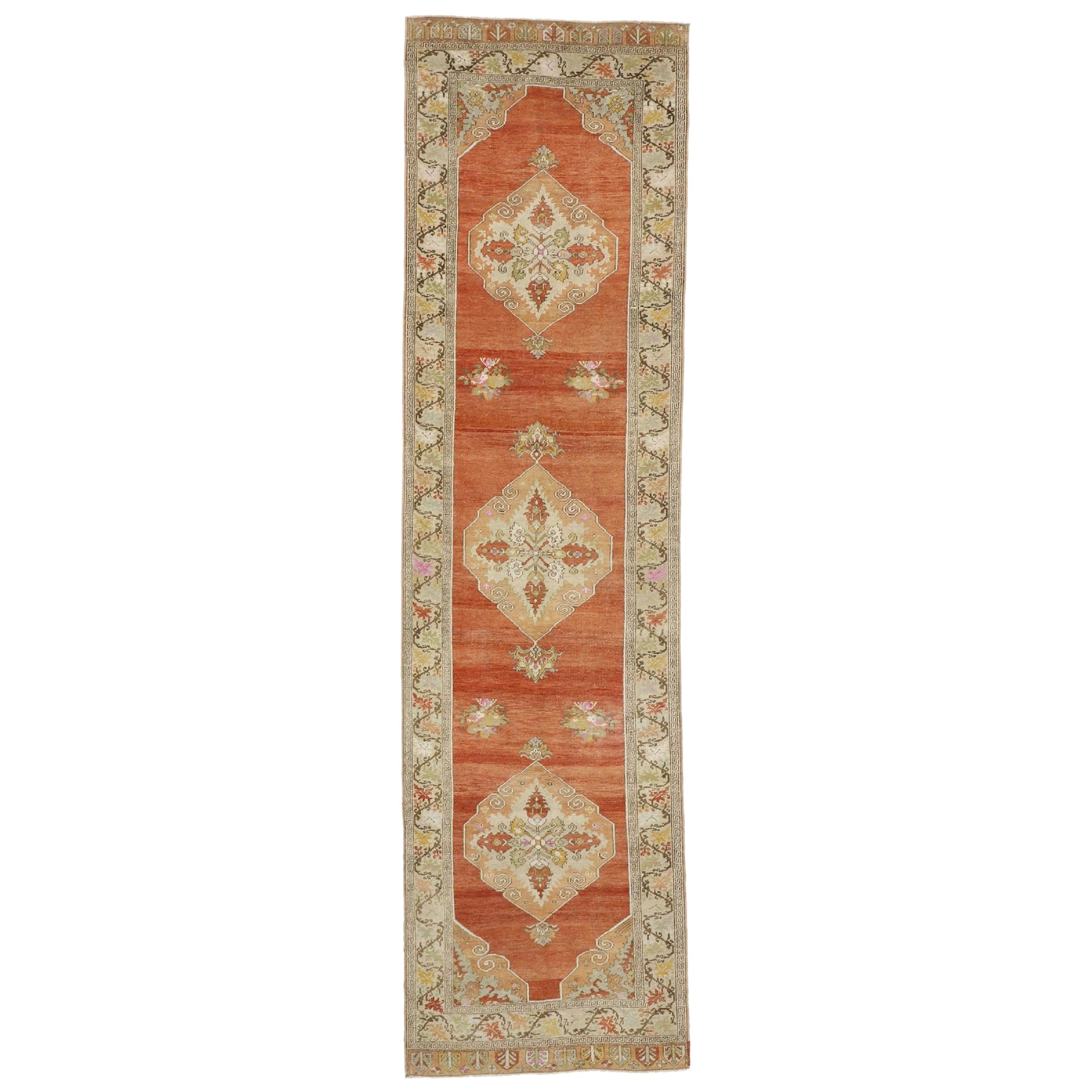 Vintage Turkish Oushak Runner with Feminine Rustic Arts & Crafts Style For Sale