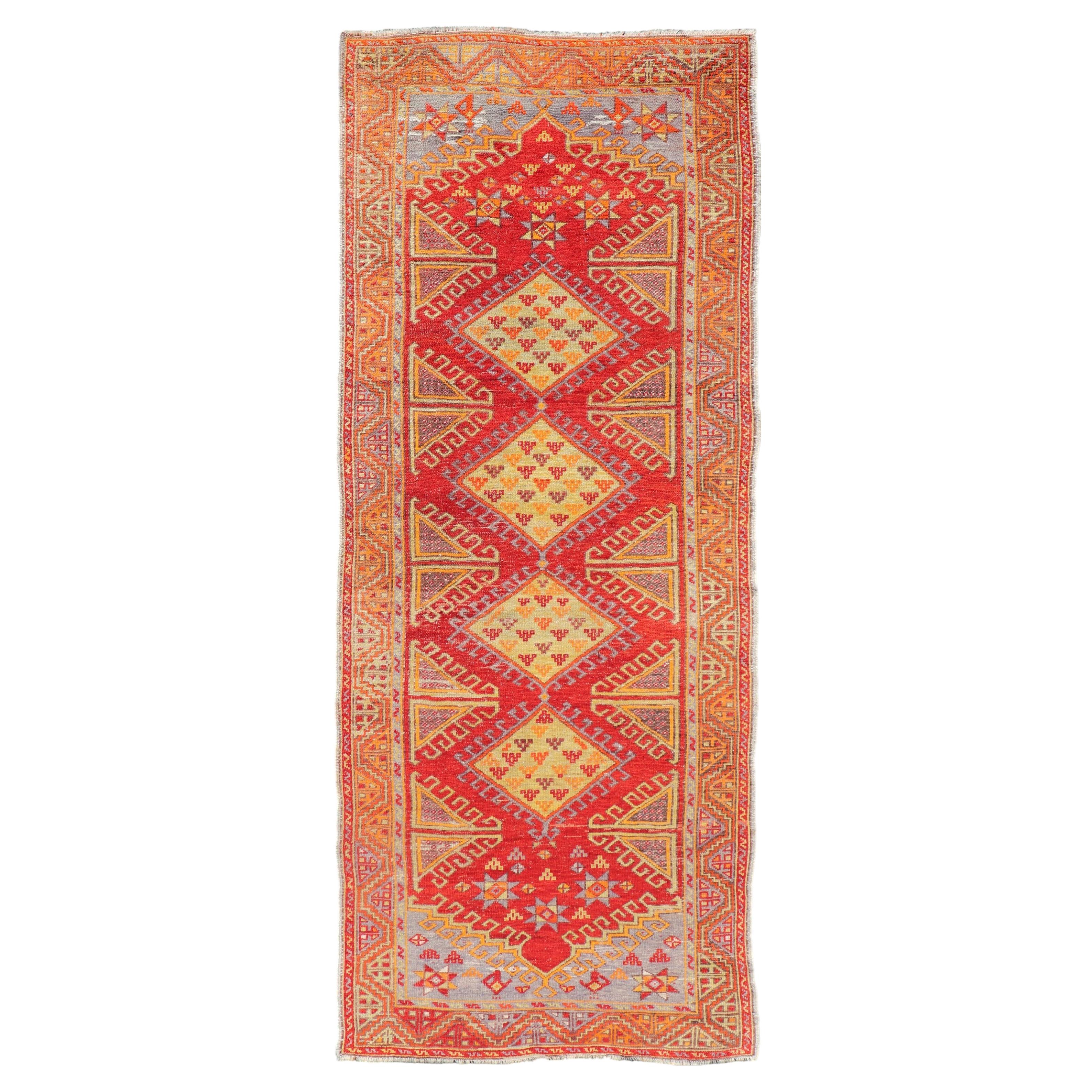 Vintage Turkish Oushak Runner With Fiery Red, Warm Gold, and Soft Lavender Tones