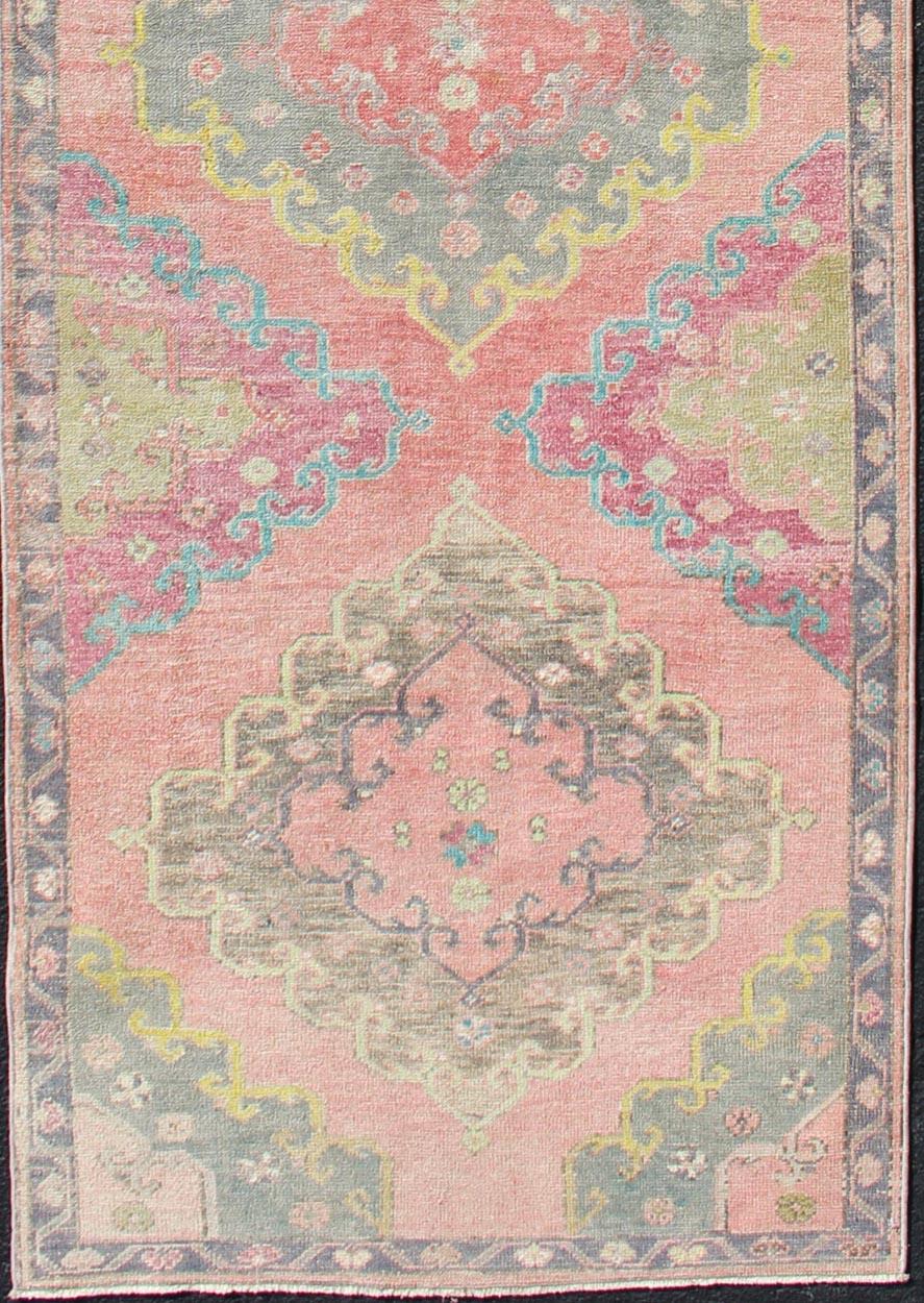 Hand-Knotted Colorful Vintage Hand Knotted Turkish Oushak Runner in Muted Tones For Sale