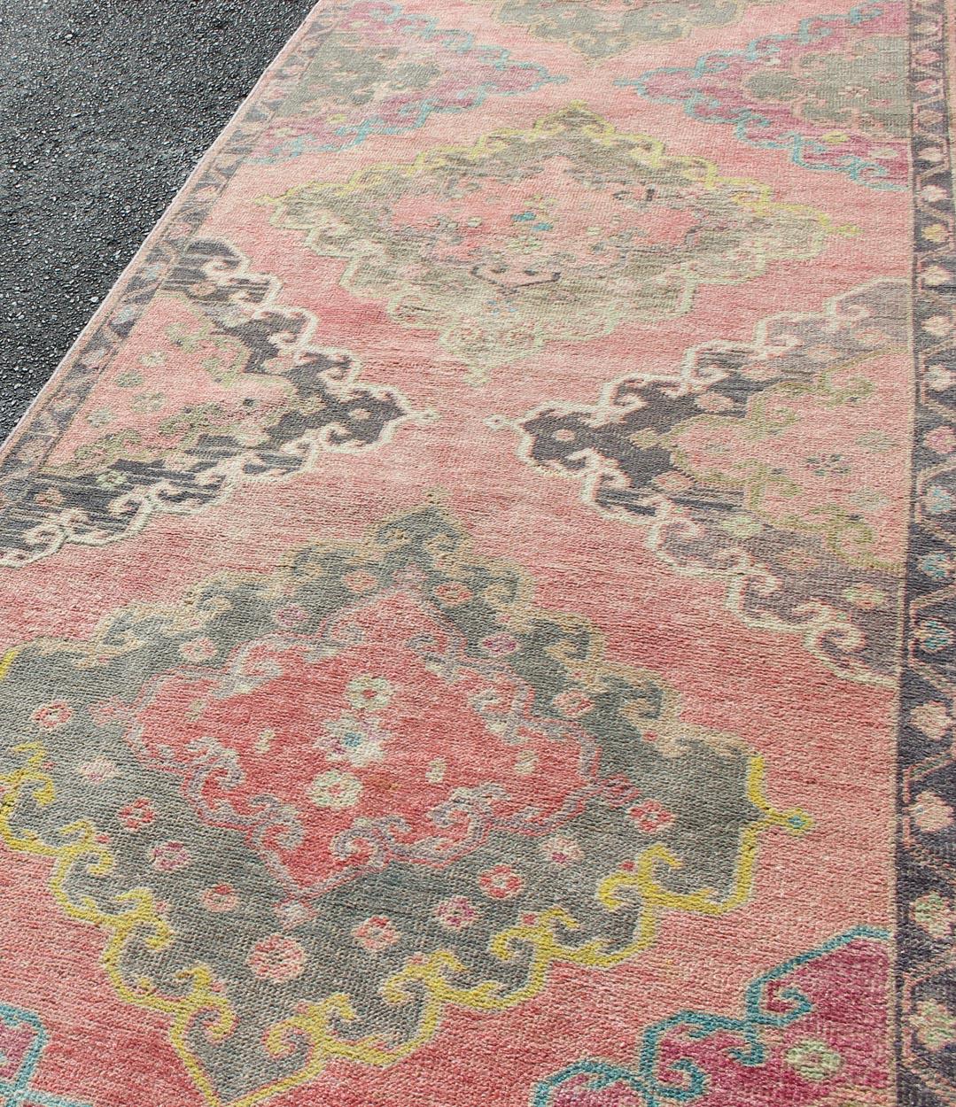 Colorful Vintage Hand Knotted Turkish Oushak Runner in Muted Tones In Excellent Condition For Sale In Atlanta, GA
