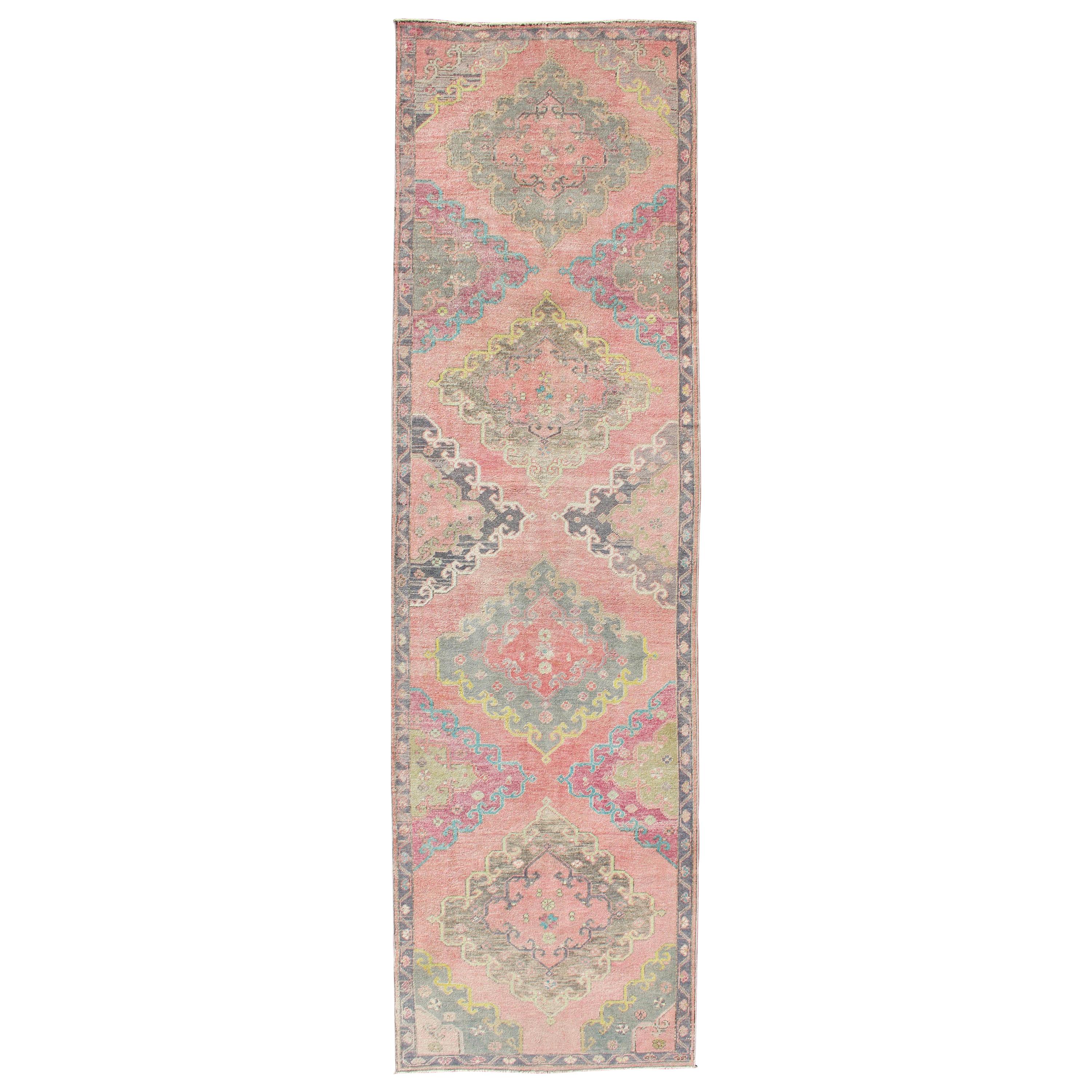 Colorful Vintage Hand Knotted Turkish Oushak Runner in Muted Tones For Sale