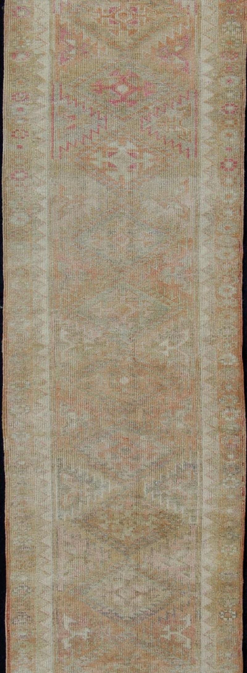 Hand-Knotted Vintage Turkish Oushak Runner with Geometric Medallion Design in Muted Orange For Sale