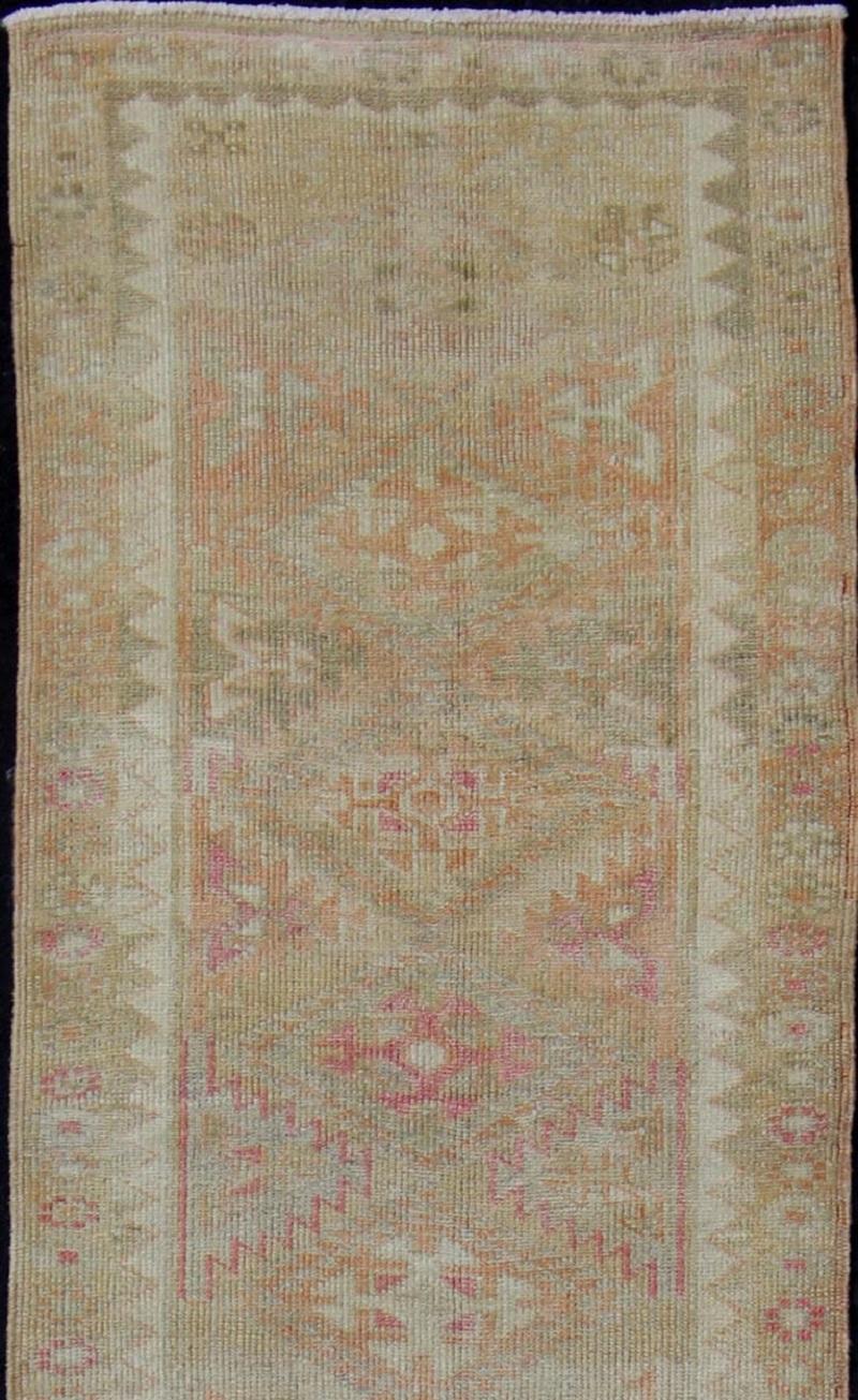 Vintage Turkish Oushak Runner with Geometric Medallion Design in Muted Orange In Good Condition For Sale In Atlanta, GA