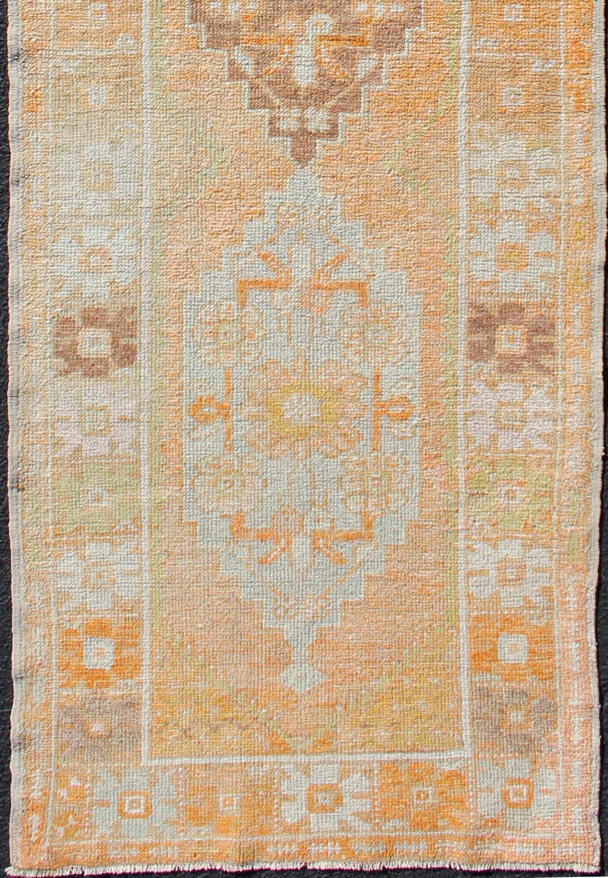 Hand-Knotted Vintage Turkish Oushak Runner with Geometric Medallions in Light Blue , Orange For Sale