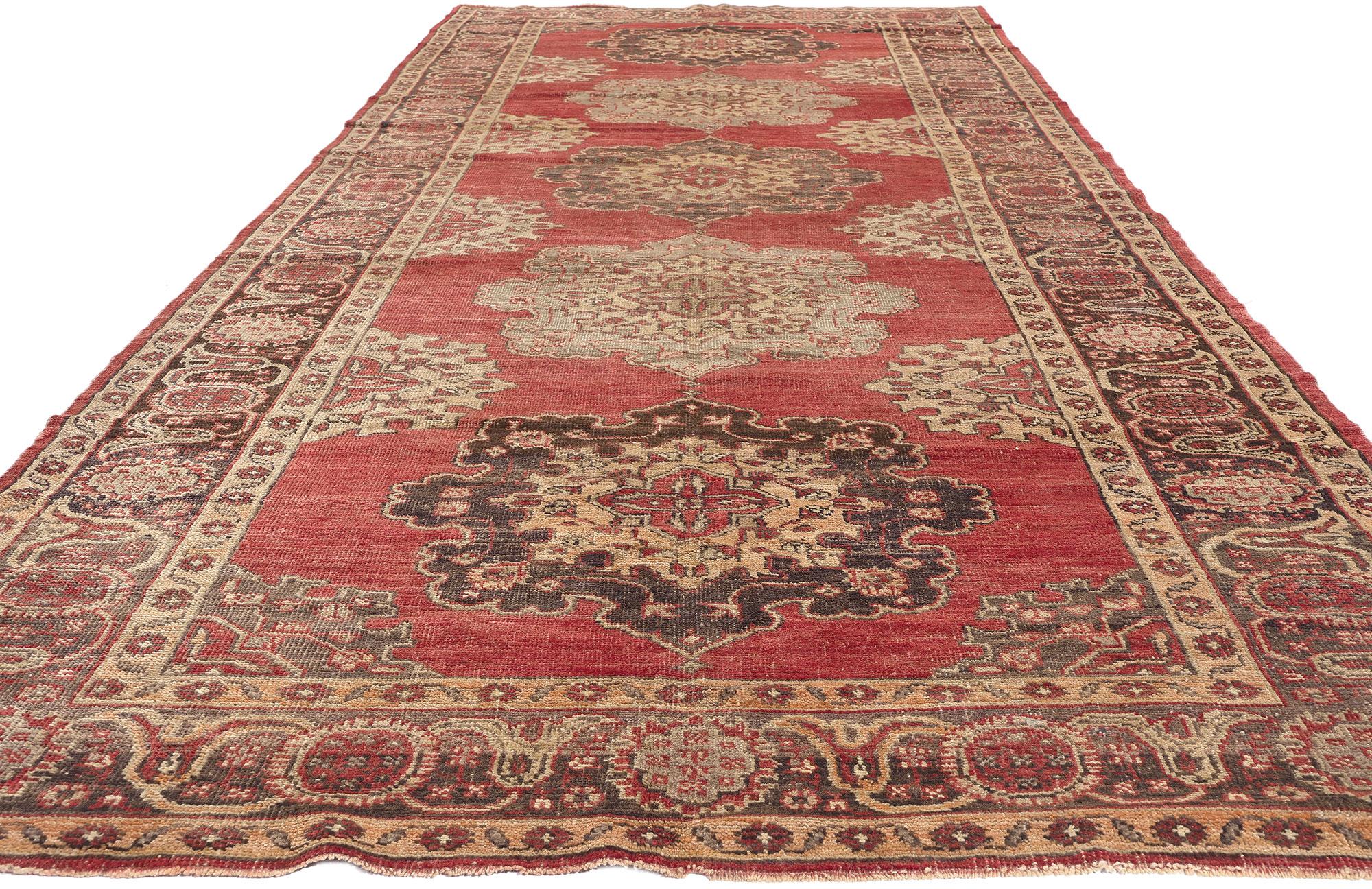 Hand-Knotted Vintage Turkish Oushak Rug, Timeless Allure Meets Rustic Earth-Tone Elegance For Sale