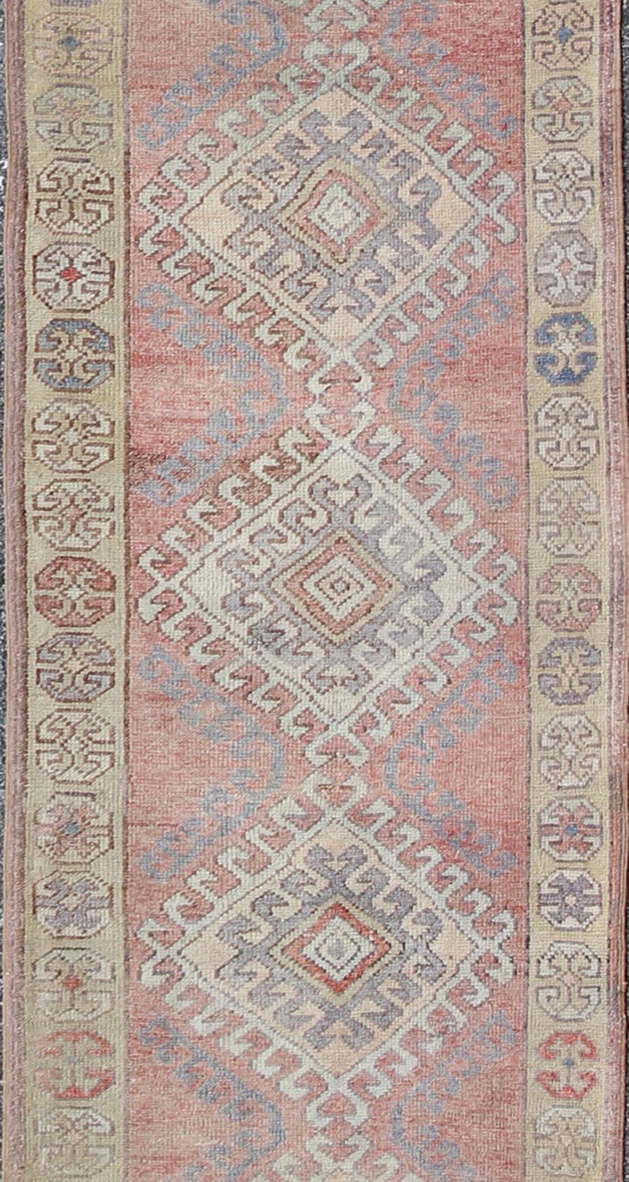 Hand-Knotted Vintage Turkish Oushak Runner with Latch Hook Medallions For Sale