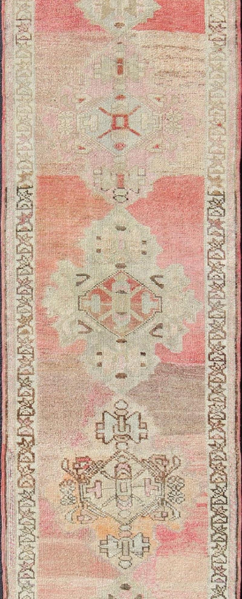 Hand-Knotted Vintage Turkish Oushak Runner with Medallion Design in Pink, Light Green & Taupe For Sale