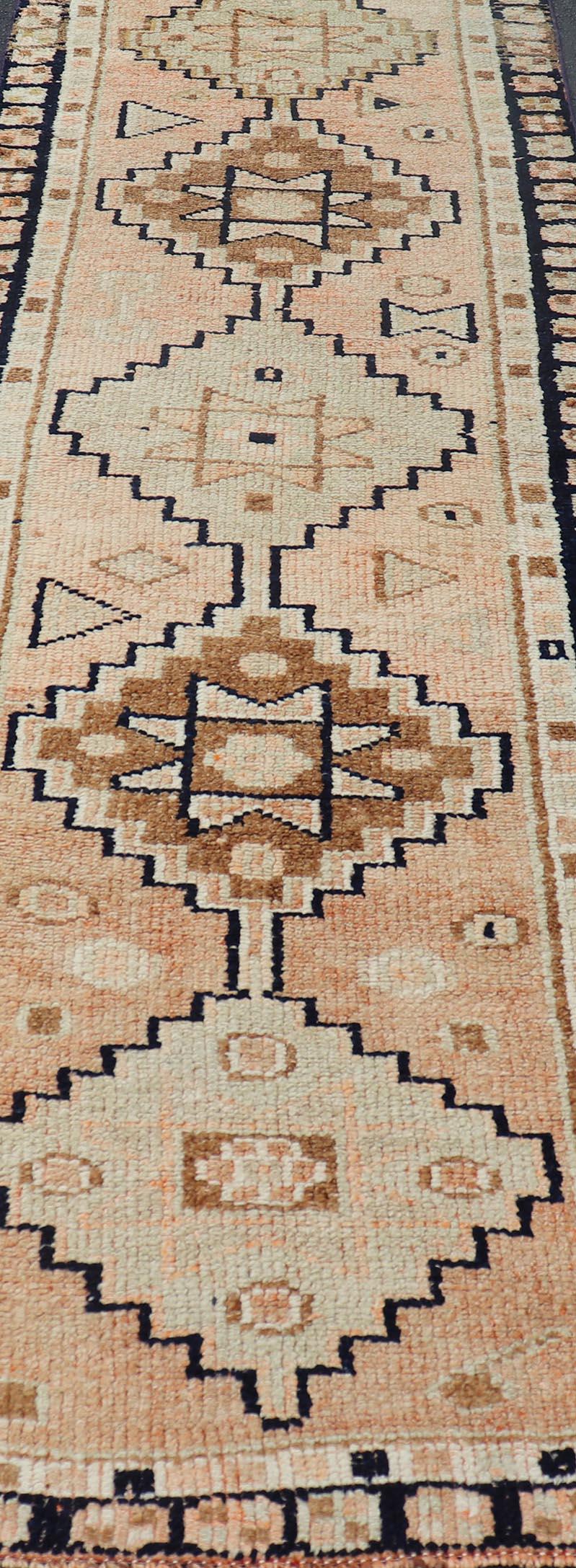 Hand-Knotted Vintage Turkish Oushak Runner with Medallion Design Outlined in Navy Blue  For Sale