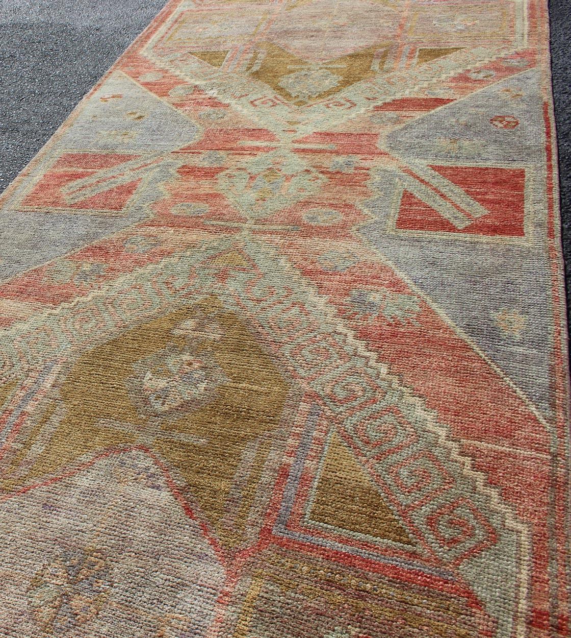 20th Century Vintage Turkish Oushak Runner with Medallions in Acid Green, Blue, Red and Green For Sale