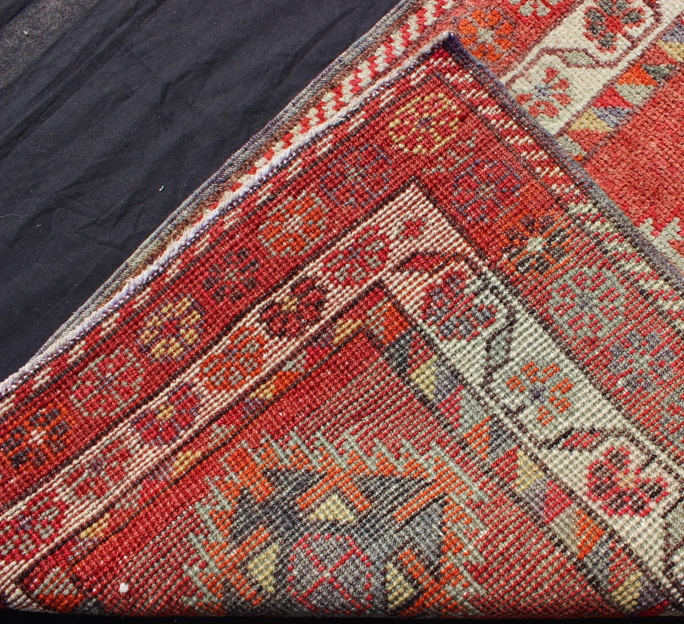 Wool Vintage Turkish Oushak Runner with Medallions in Rust Red and Multi Colors For Sale