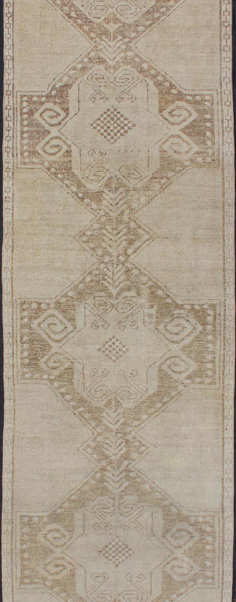 Hand-Knotted Vintage Turkish Oushak Runner with Medallions in Taupe, Tan, and Browns For Sale