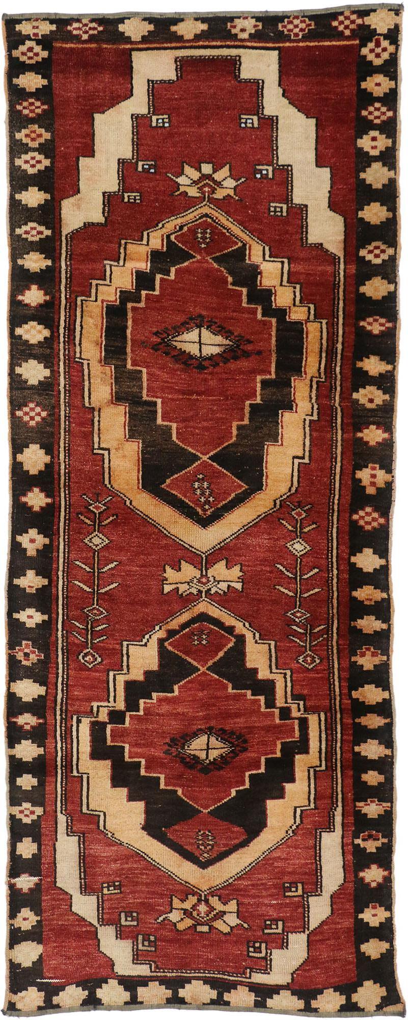 51674 Vintage Turkish Oushak Runner with Mid-Century Modern Style 03'05 x 08'08. This hand-knotted wool vintage Turkish Oushak runner features a geometric pattern with two large stair-step medallions in an abrashed dark red field flanked with