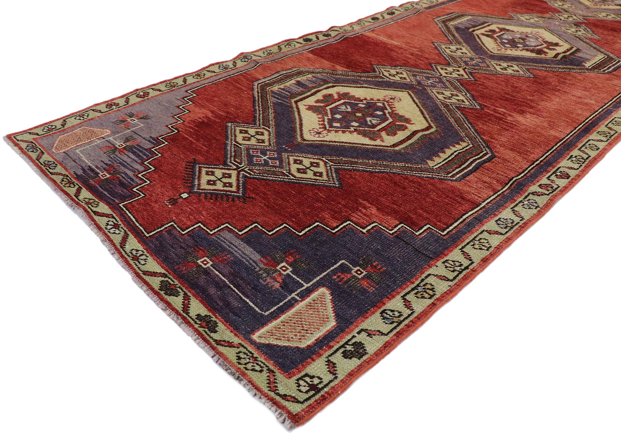 53521, vintage Turkish Oushak runner with Mid-Century Modern style 03'05 x 10'03. With its striking appeal and saturated red color palette, this hand-knotted wool vintage Turkish Oushak runner appears like a sumptuous Italian velvet, recalling the