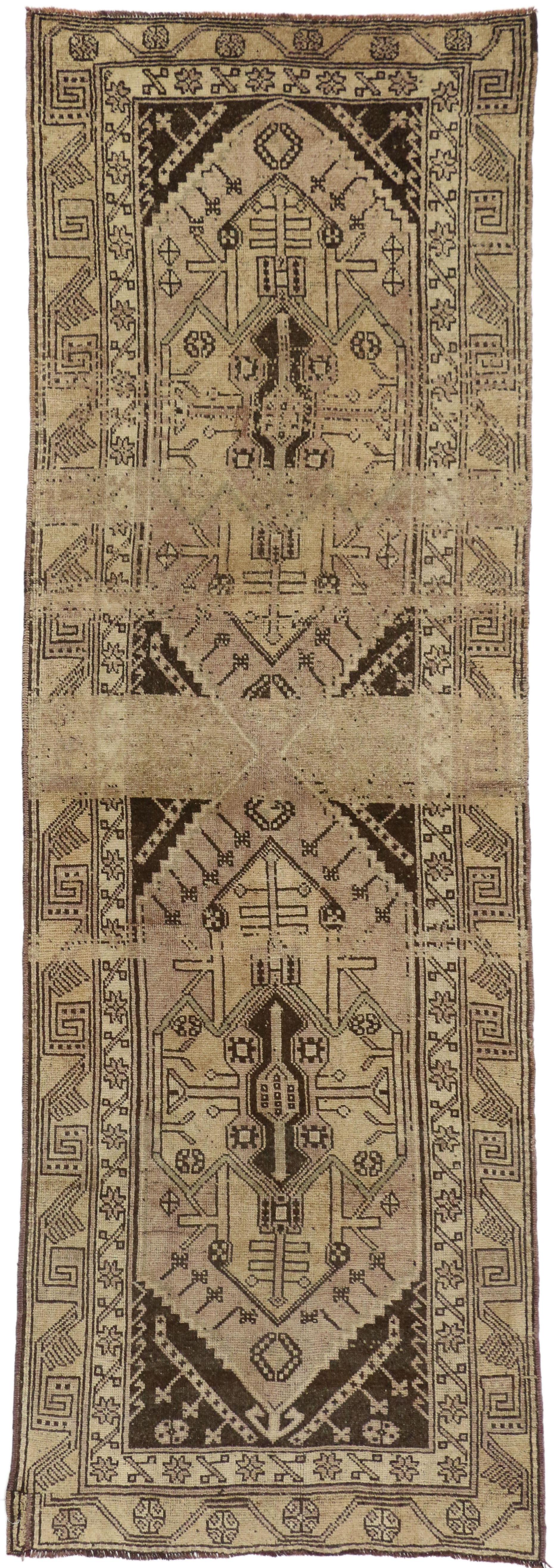 50749 Vintage Turkish Oushak Carpet Runner with Mid-Century Modern Style 03'06 x 10'07. Warm and inviting, this hand knotted wool vintage Turkish Oushak runner beautifully embodies Mid-Century Modern style. It features two large-scale mirrored