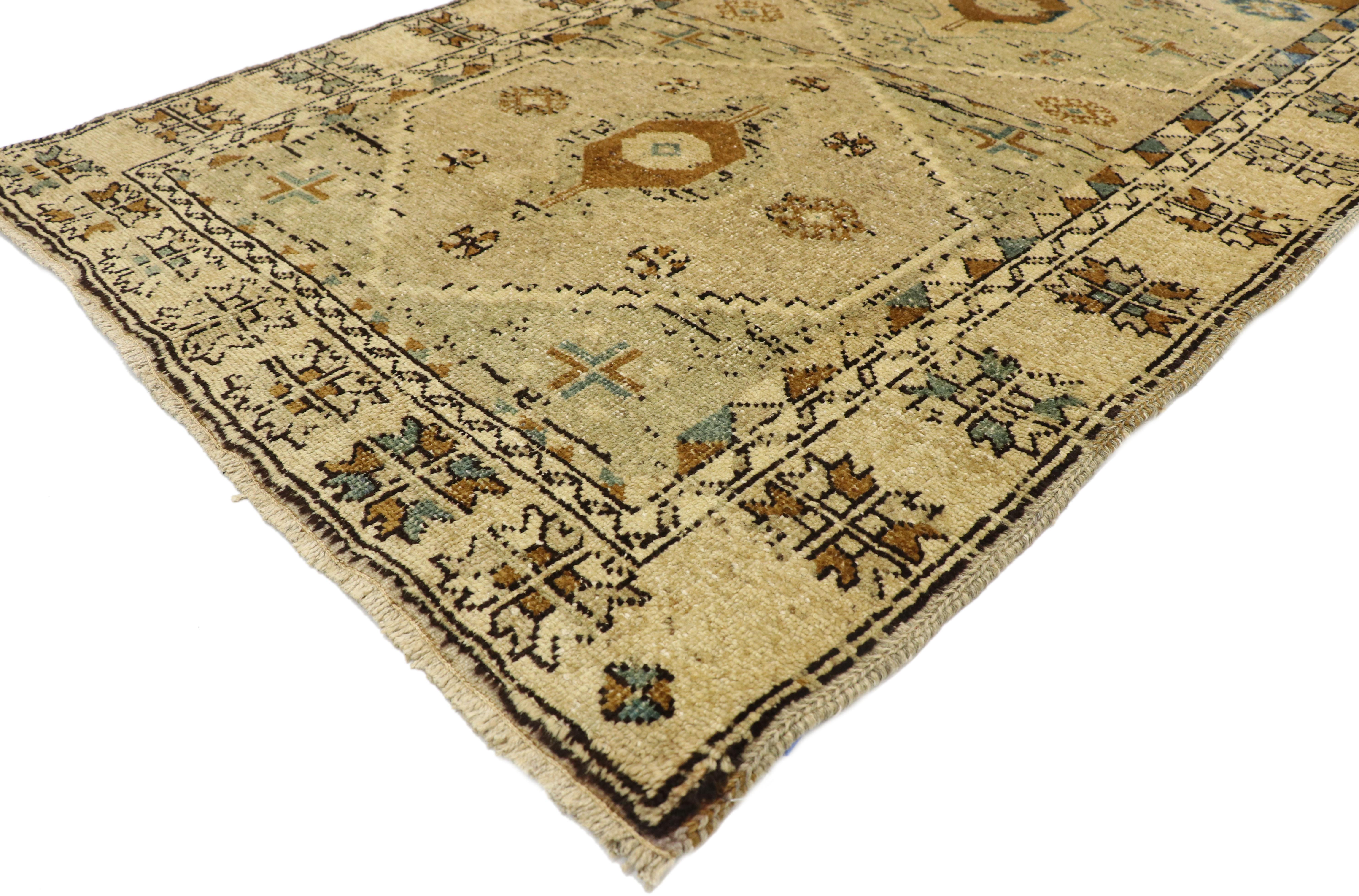 52852 vintage Turkish Oushak runner with Mid-Century Modern style. Warm and inviting, this hand knotted wool vintage Turkish Oushak runner beautifully embodies Mid-Century Modern style. It features five stepped hexagonal medallions in a compartment