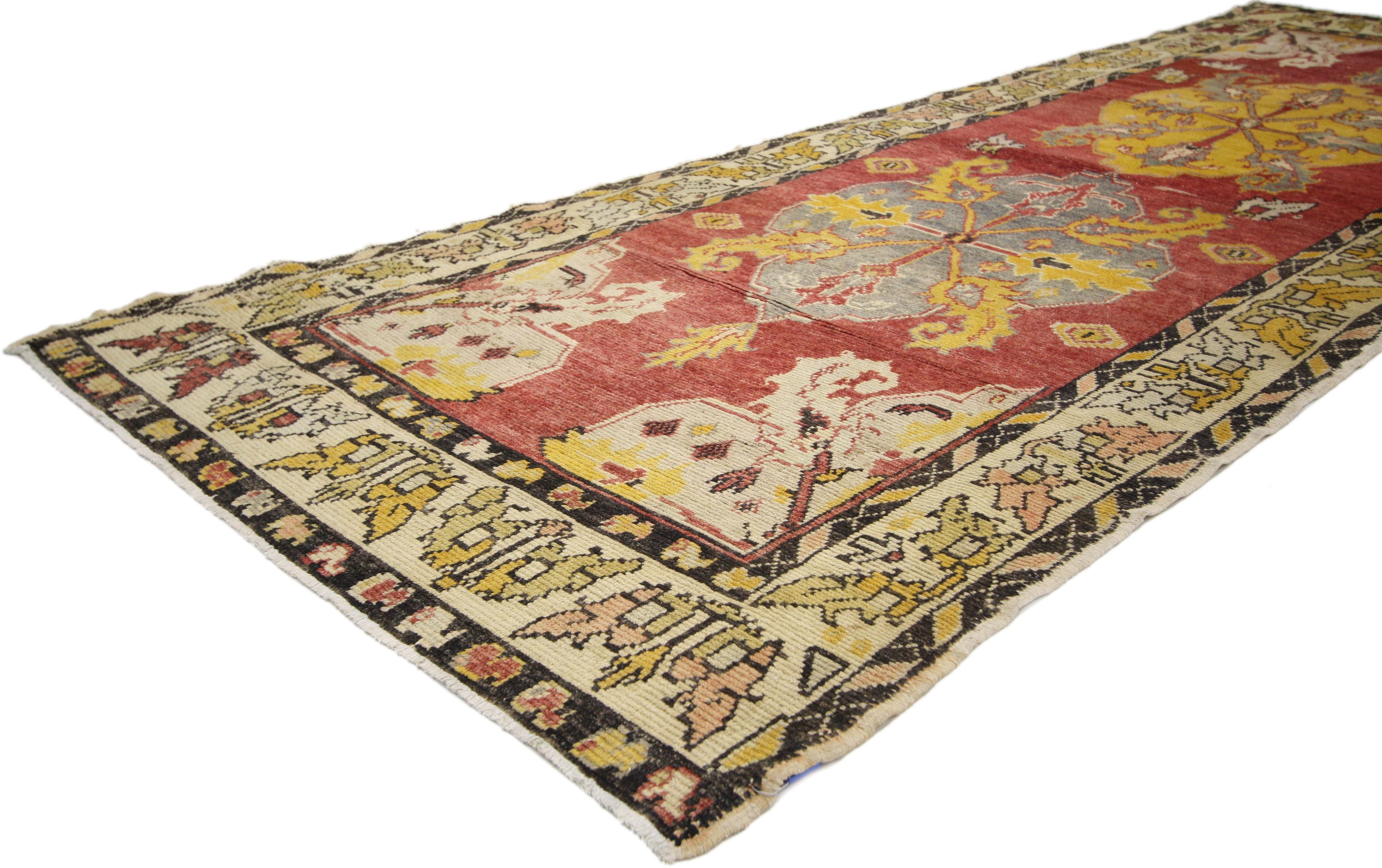 74476 Vintage Turkish Oushak Rug Runner with Mid-Century Modern Style, Hallway Runner. With its stately presence and vibrant colors, this vintage Turkish Oushak carpet runner features a traditional modern style. Along the center, two well-balanced