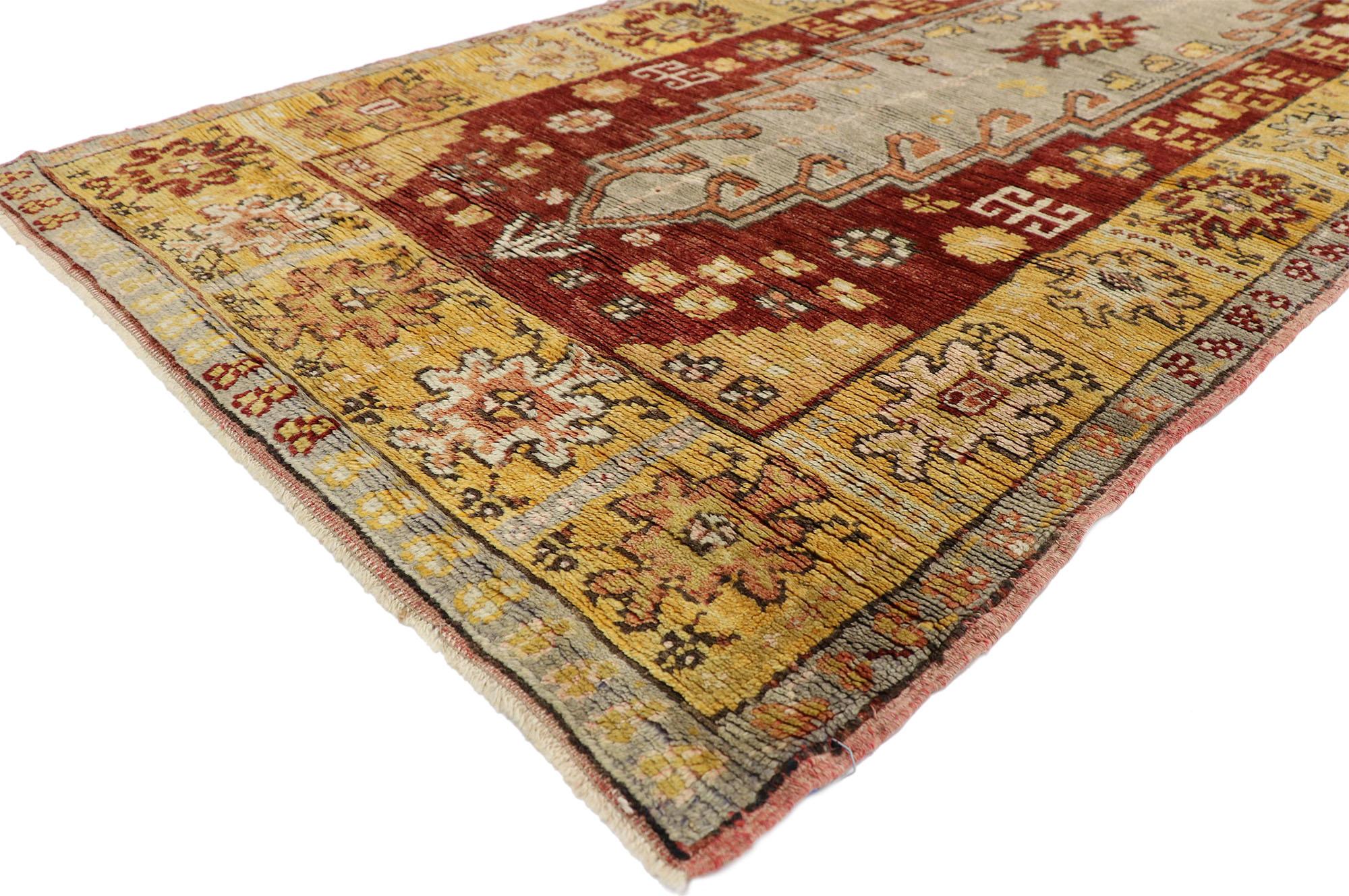 50651 Vintage Turkish Oushak Runner, 03'06 x 11'00.
This hand-knotted wool vintage Turkish Oushak runner features two medallions and a classic palette of deep red, subdued grey, cream and golden saffron tones whose pleasing qualities are enhanced by